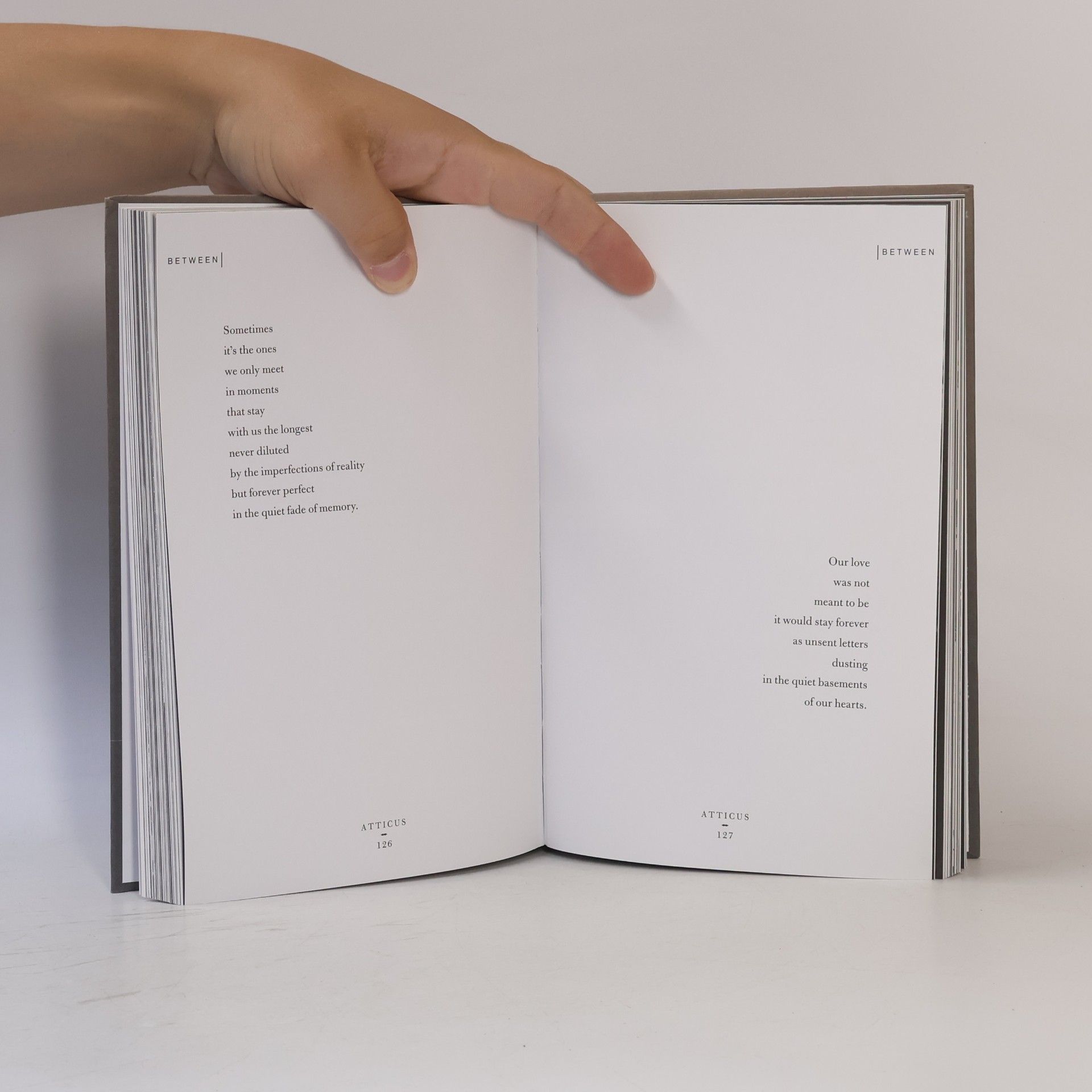 Atticus The dark between stars: Poems