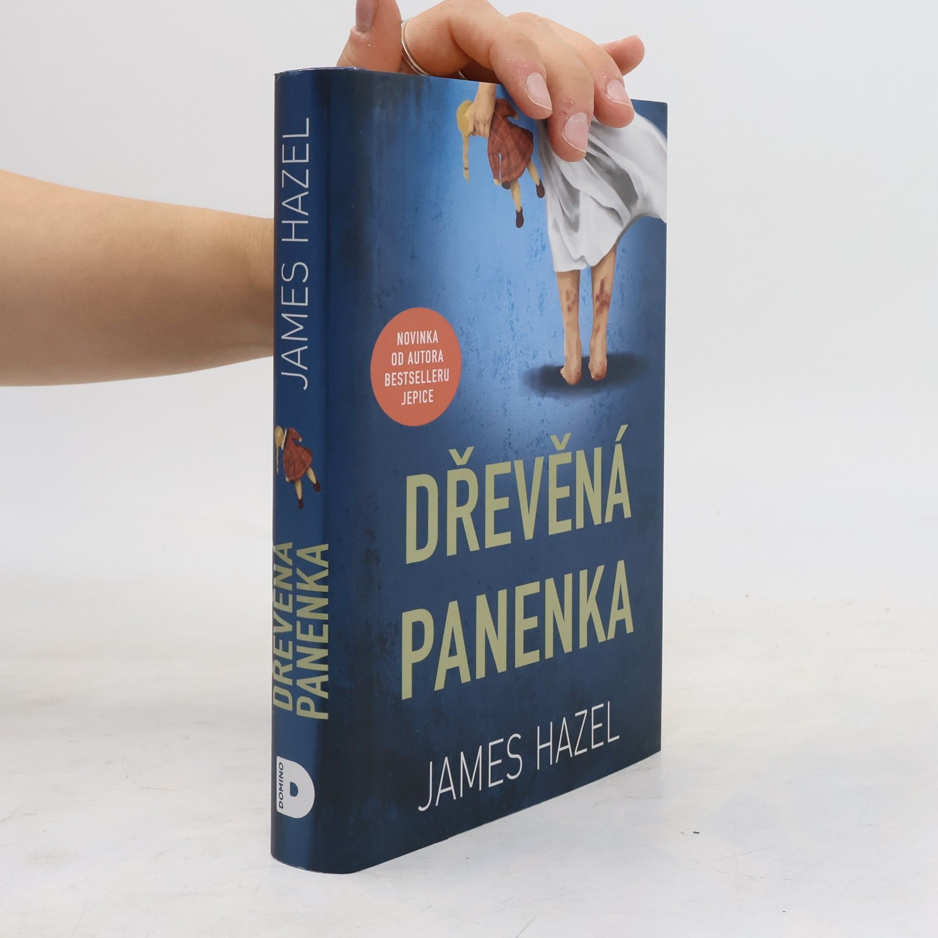 James Hazel Dřevěná panenka
