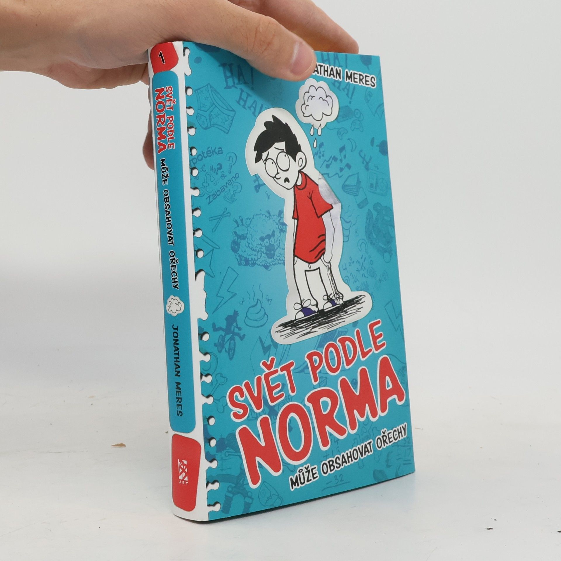 Johnny Meres Svět podle Norma. Může obsahovat ořechy