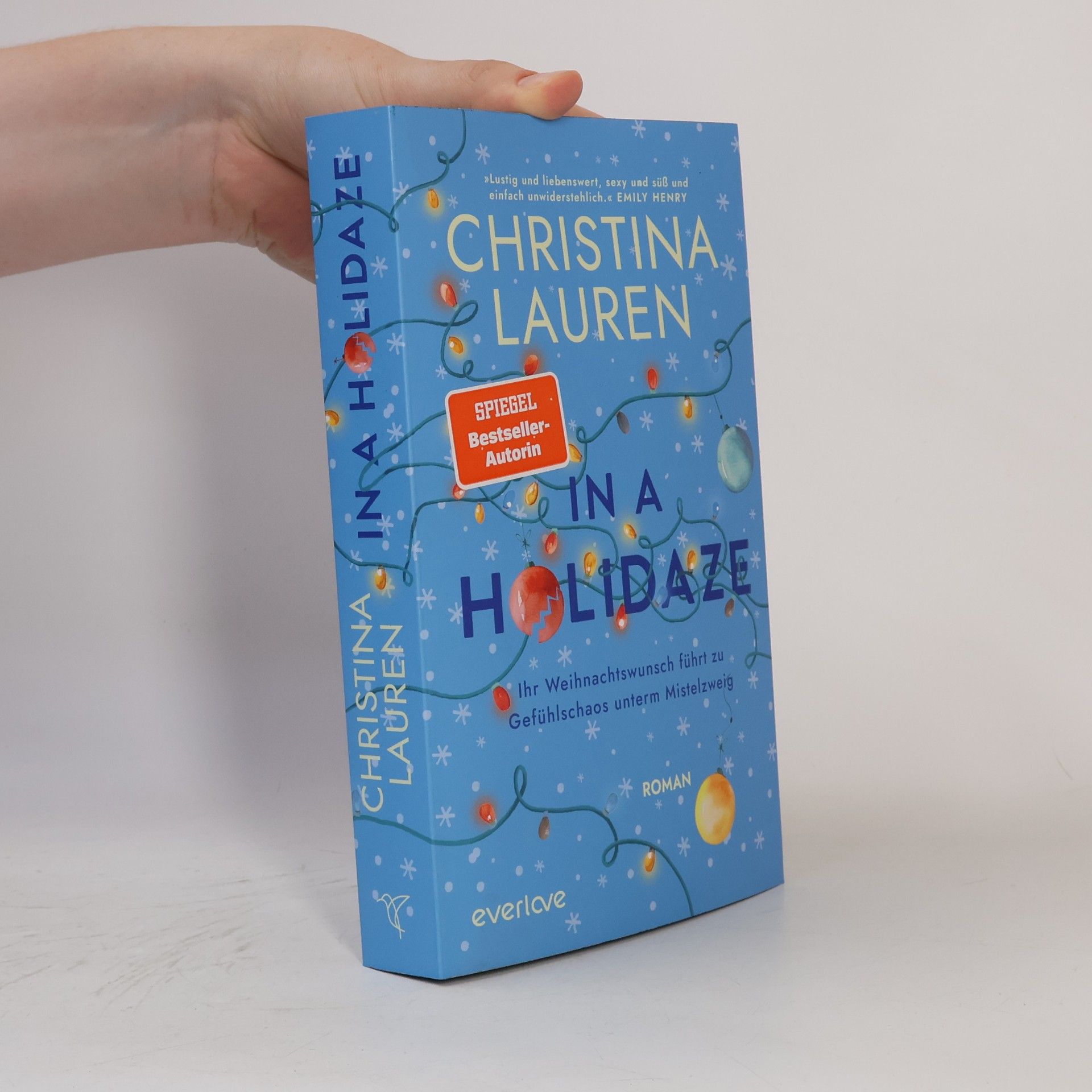 Christina Laurenová In a Holidaze - Ihr Weihnachtswunsch führt zu Gefühlschaos unterm Mistelzweig