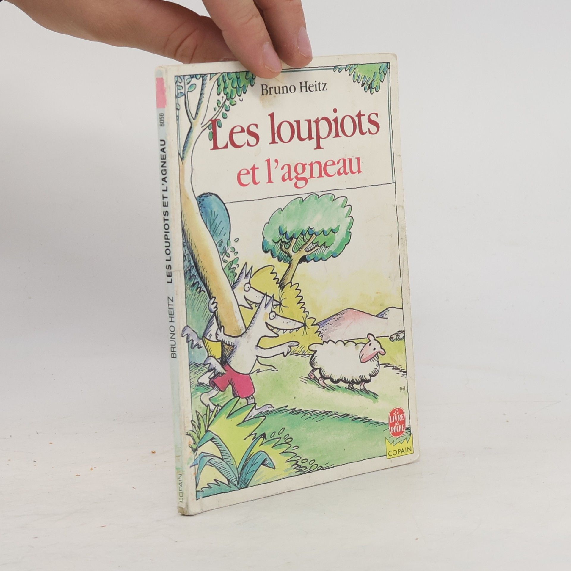 Livre de Poche: Les loupiots et l'agneau
