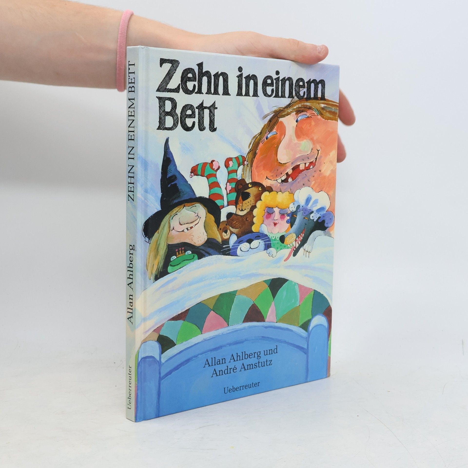 Zehn in einem Bett