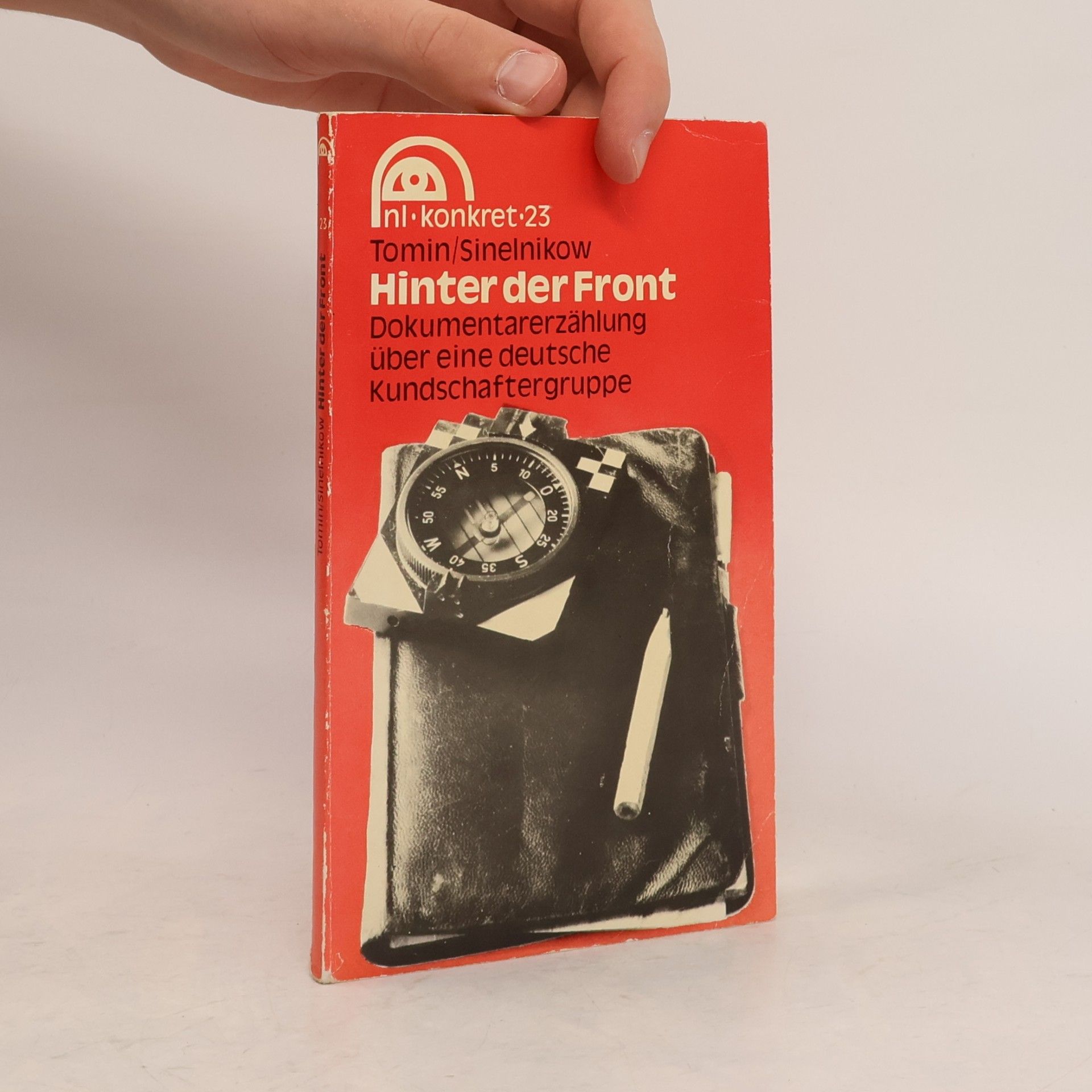 V. Tomin Hinter der Front