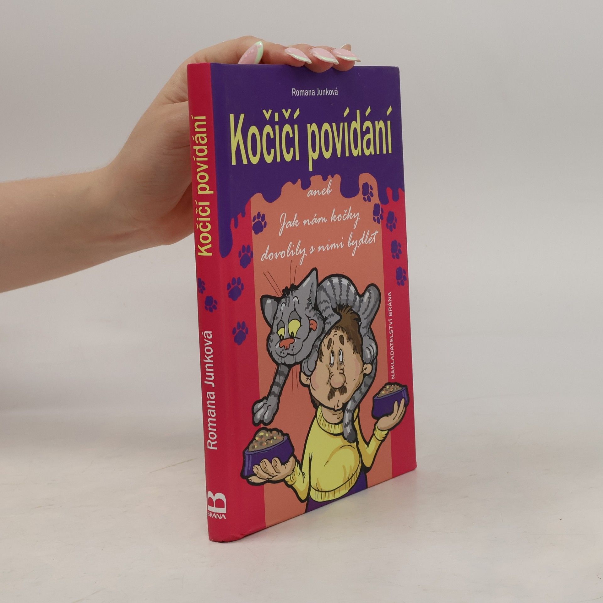 Romana Junková Kočičí povídání, aneb, Jak nám kočky dovolily s nimi bydlet