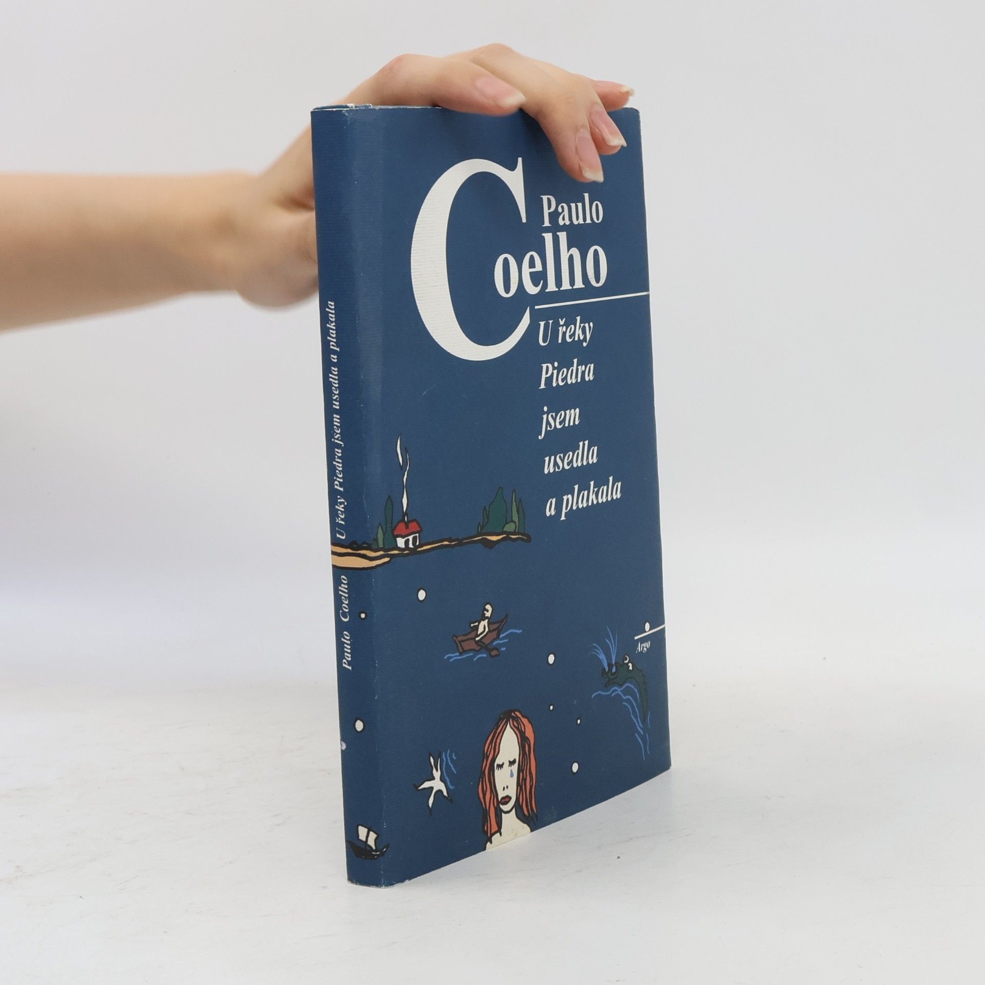 Paulo Coelho U řeky Piedra jsem usedla a plakala
