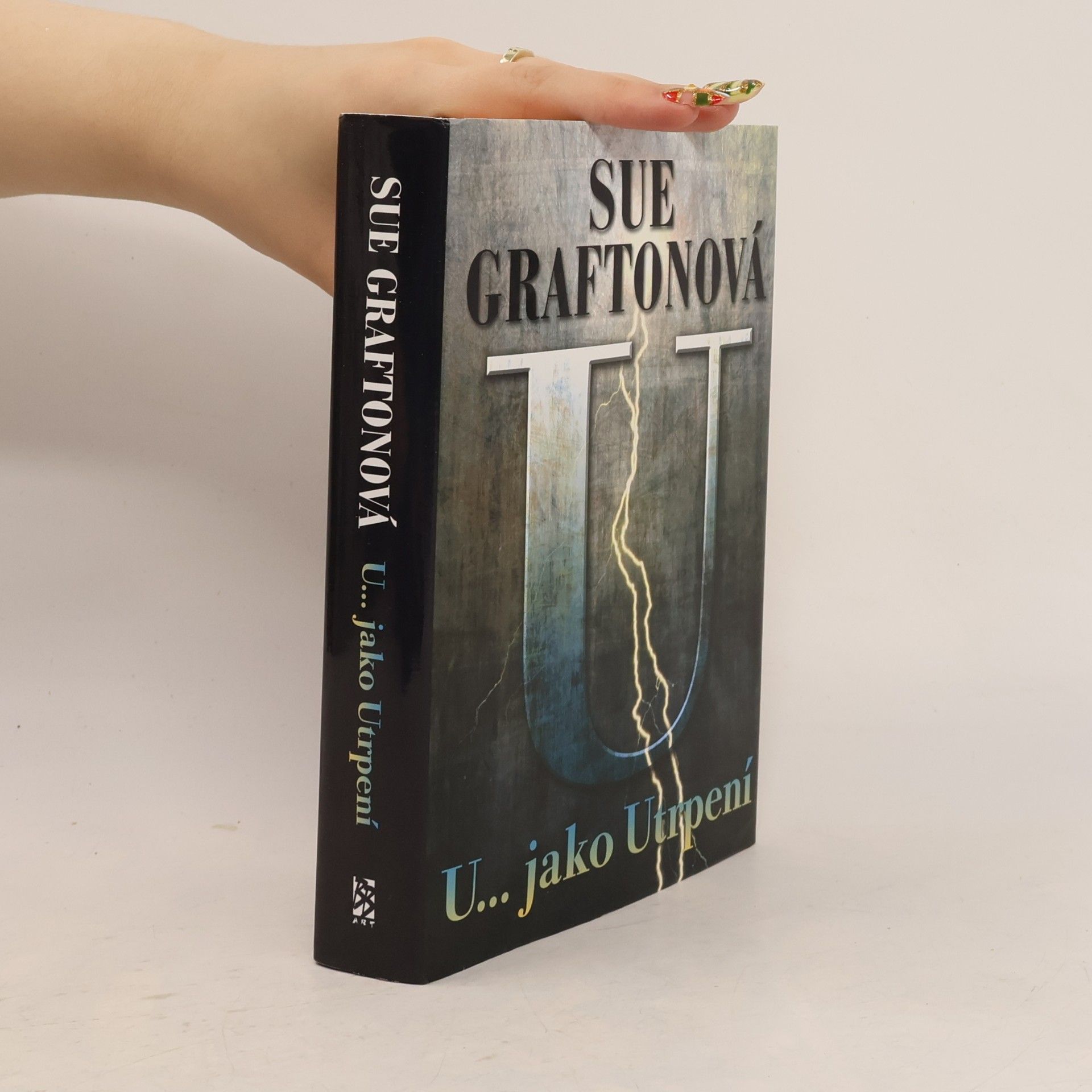 Sue Grafton U... jako Utrpení