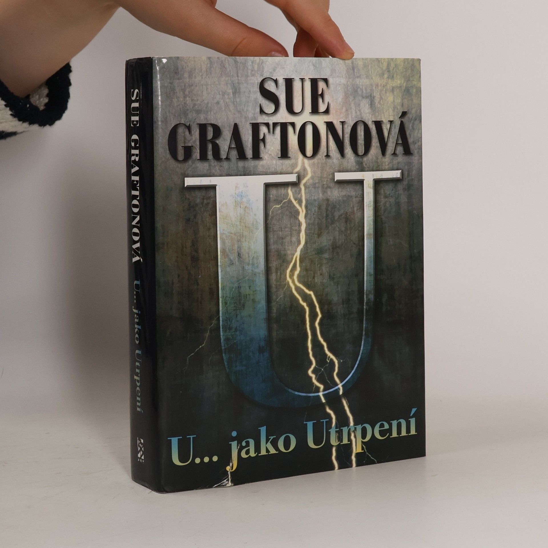 Sue Grafton U... jako Utrpení