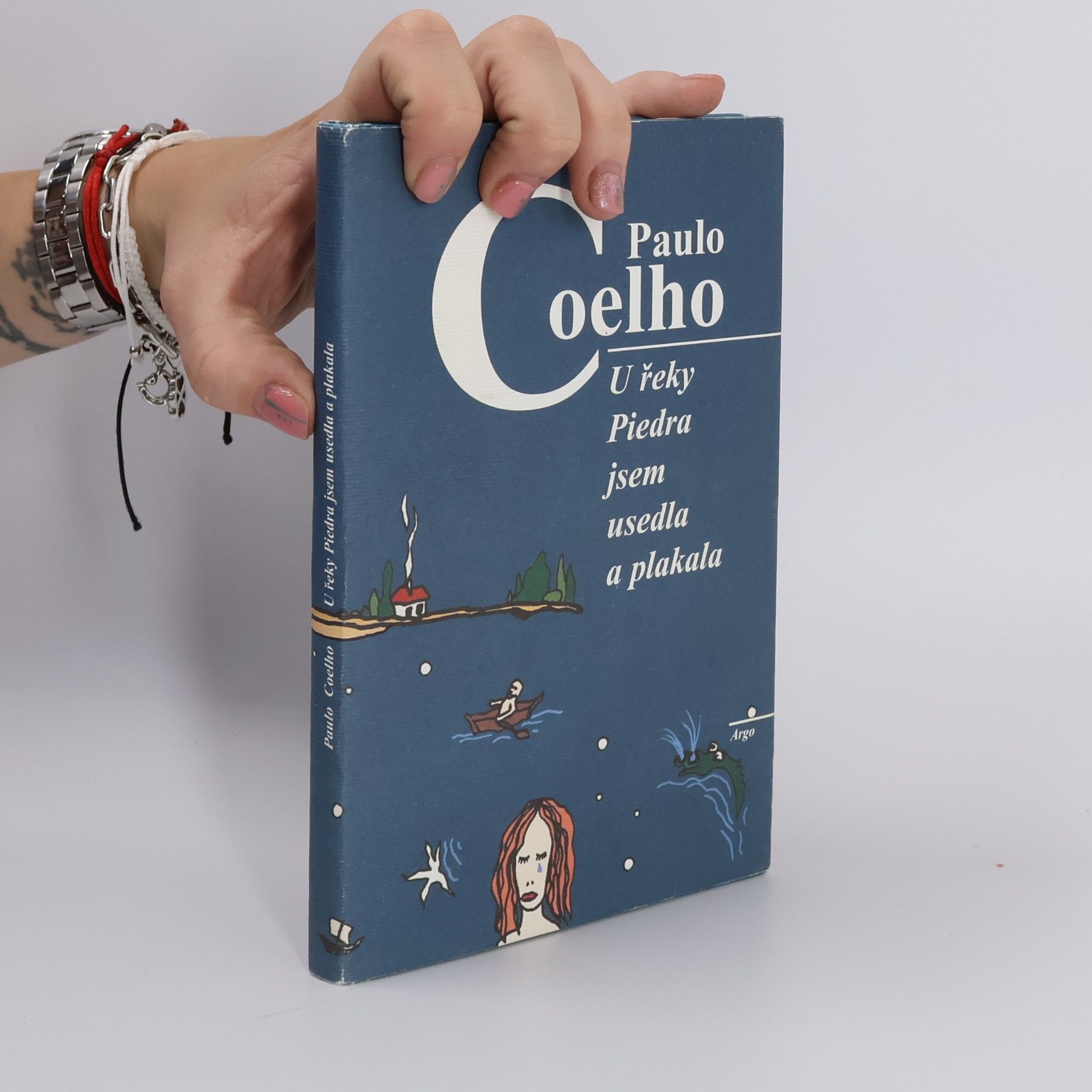 Paulo Coelho U řeky Piedra jsem usedla a plakala