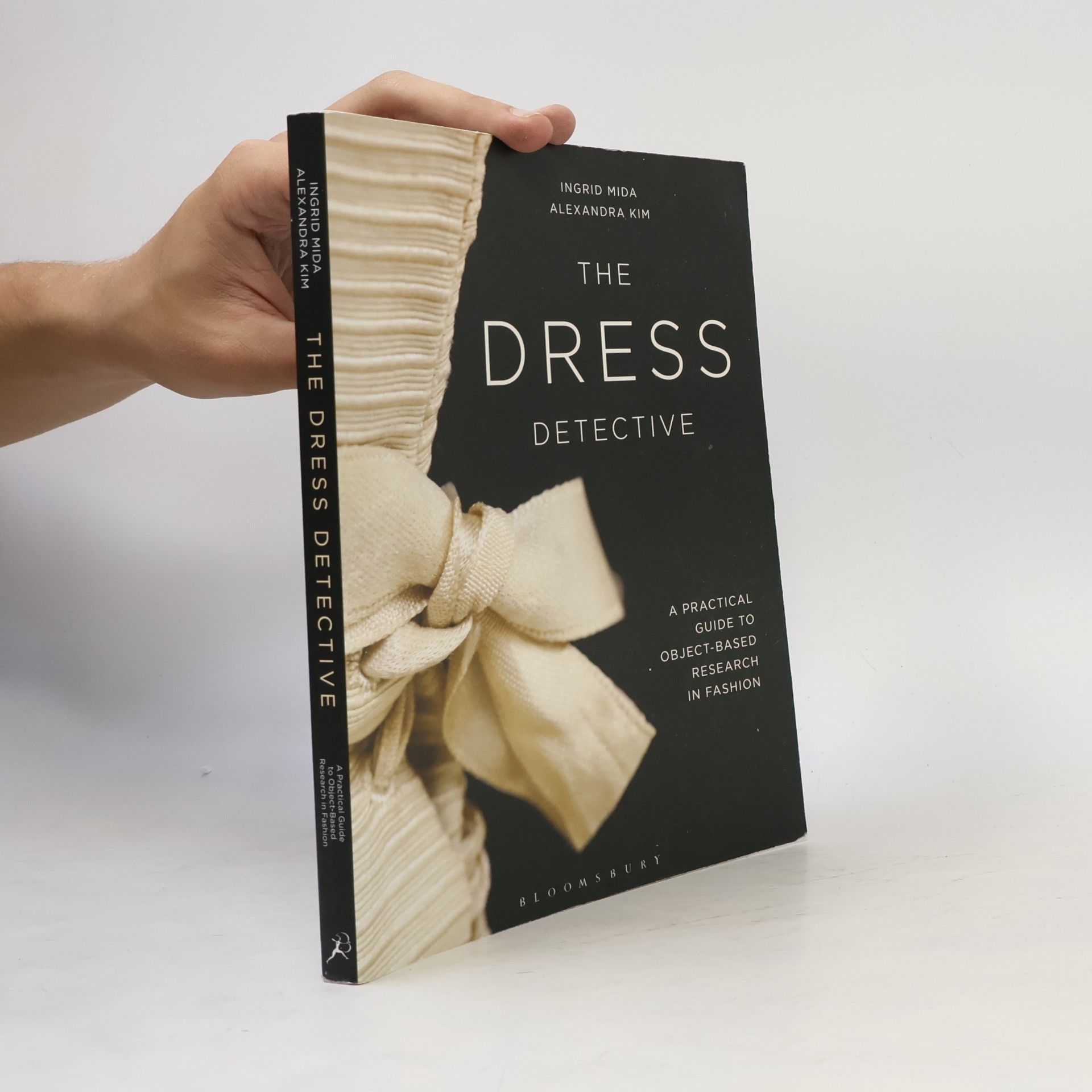 Ingrid E. Mida The Dress Detective