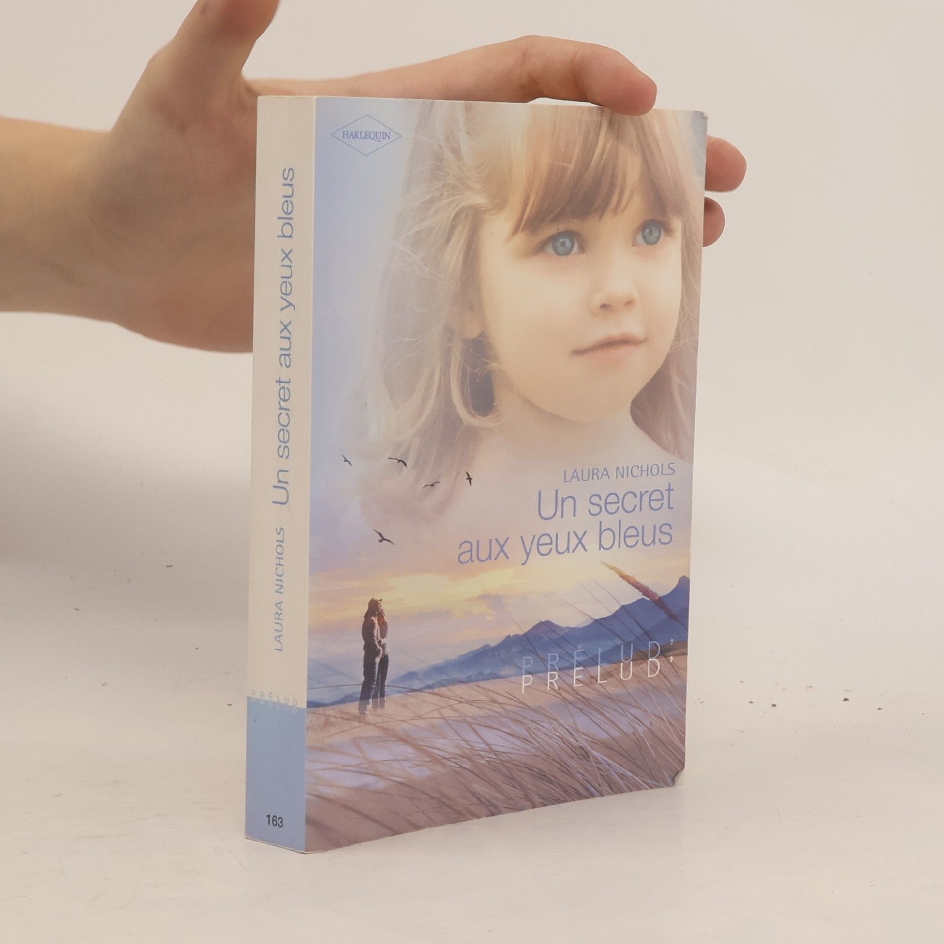 Laura Nichols Un secret aux yeux bleus