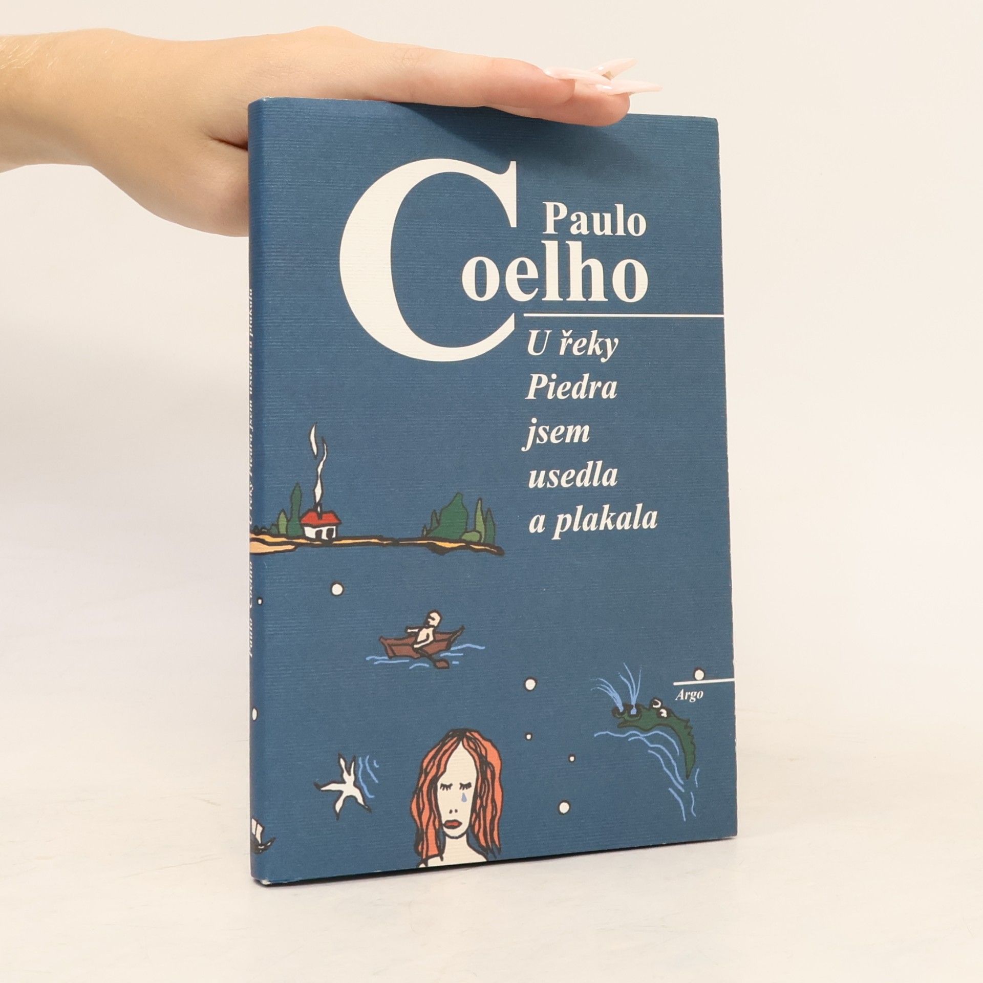 Paulo Coelho U řeky Piedra jsem usedla a plakala