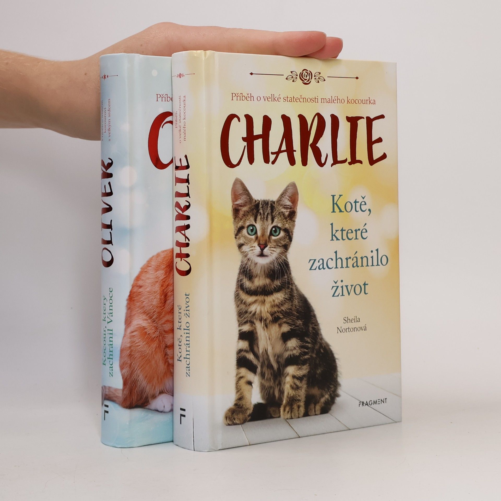 Sheila Norton Kočičí příběhy: Charlie : kotě, které zachránilo život. Oliver : kocour, který zachránil Vánoce