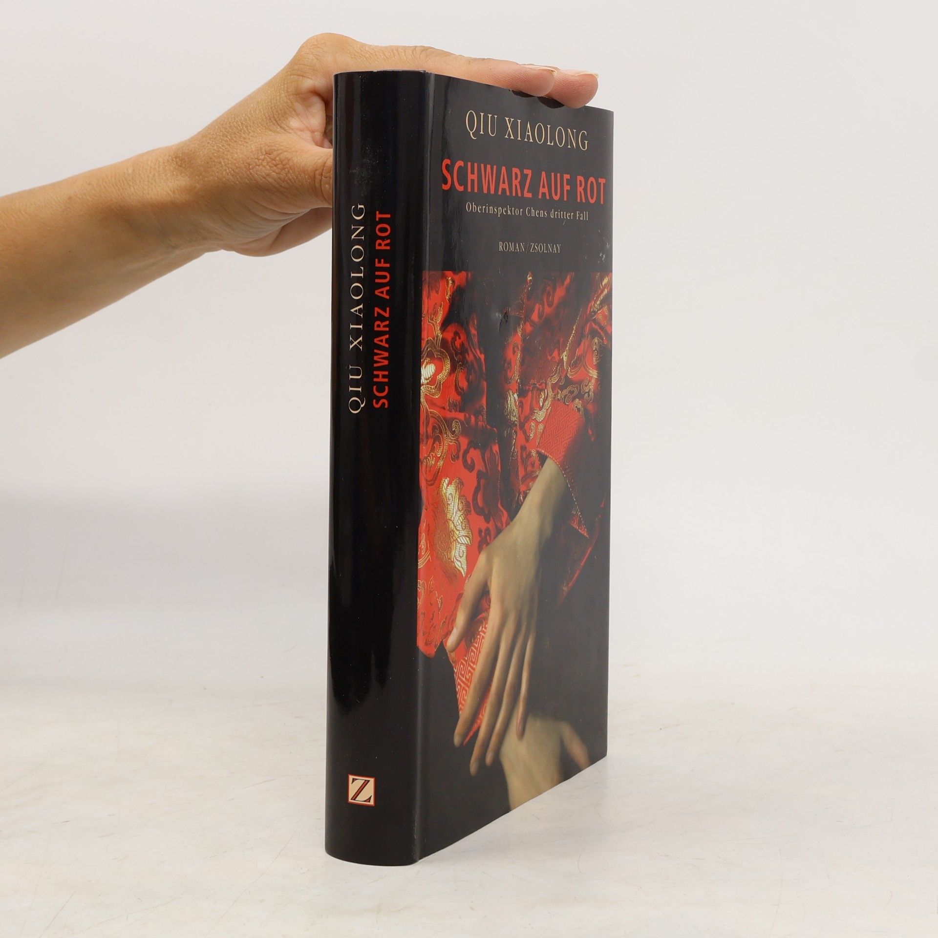 Qiu Xiaolong Schwarz auf Rot