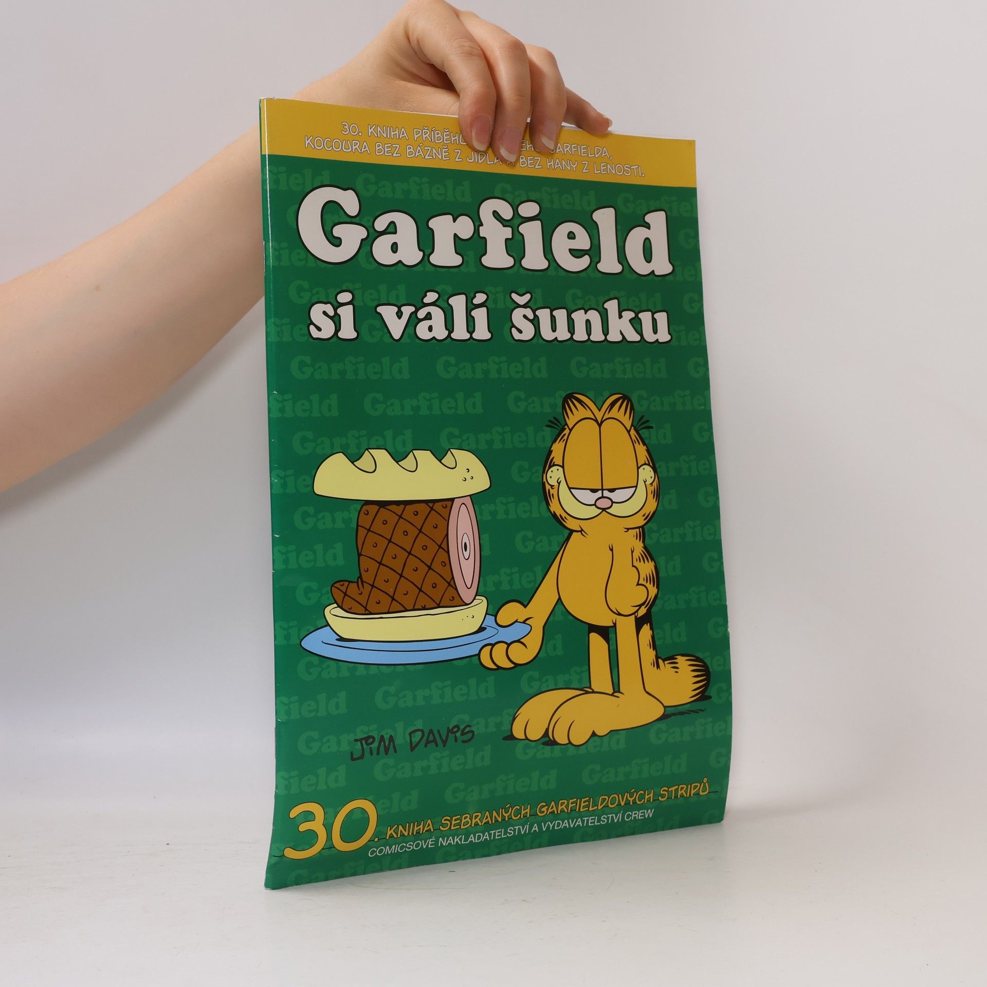 Jim Davis Garfield si válí šunku