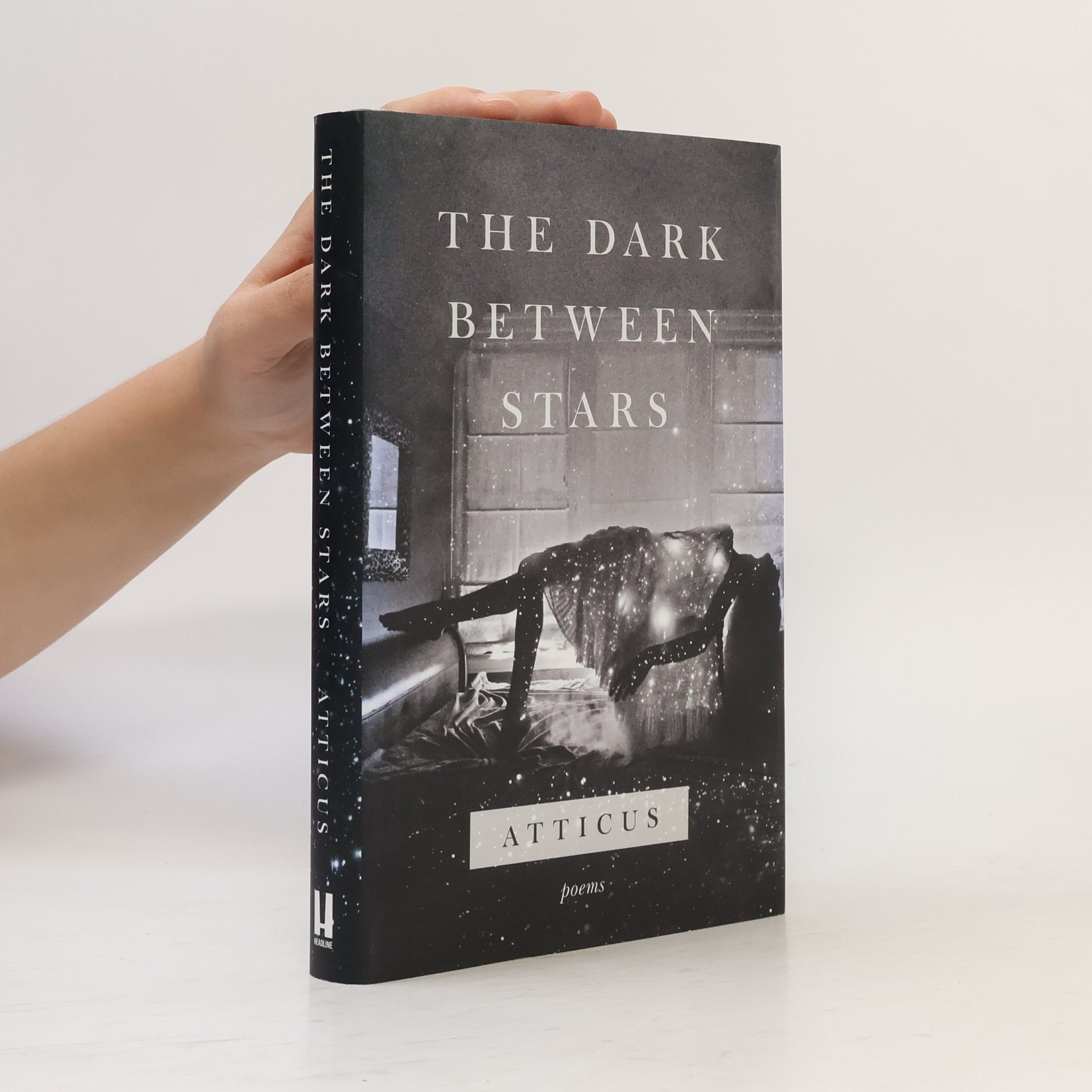 Atticus The dark between stars: Poems