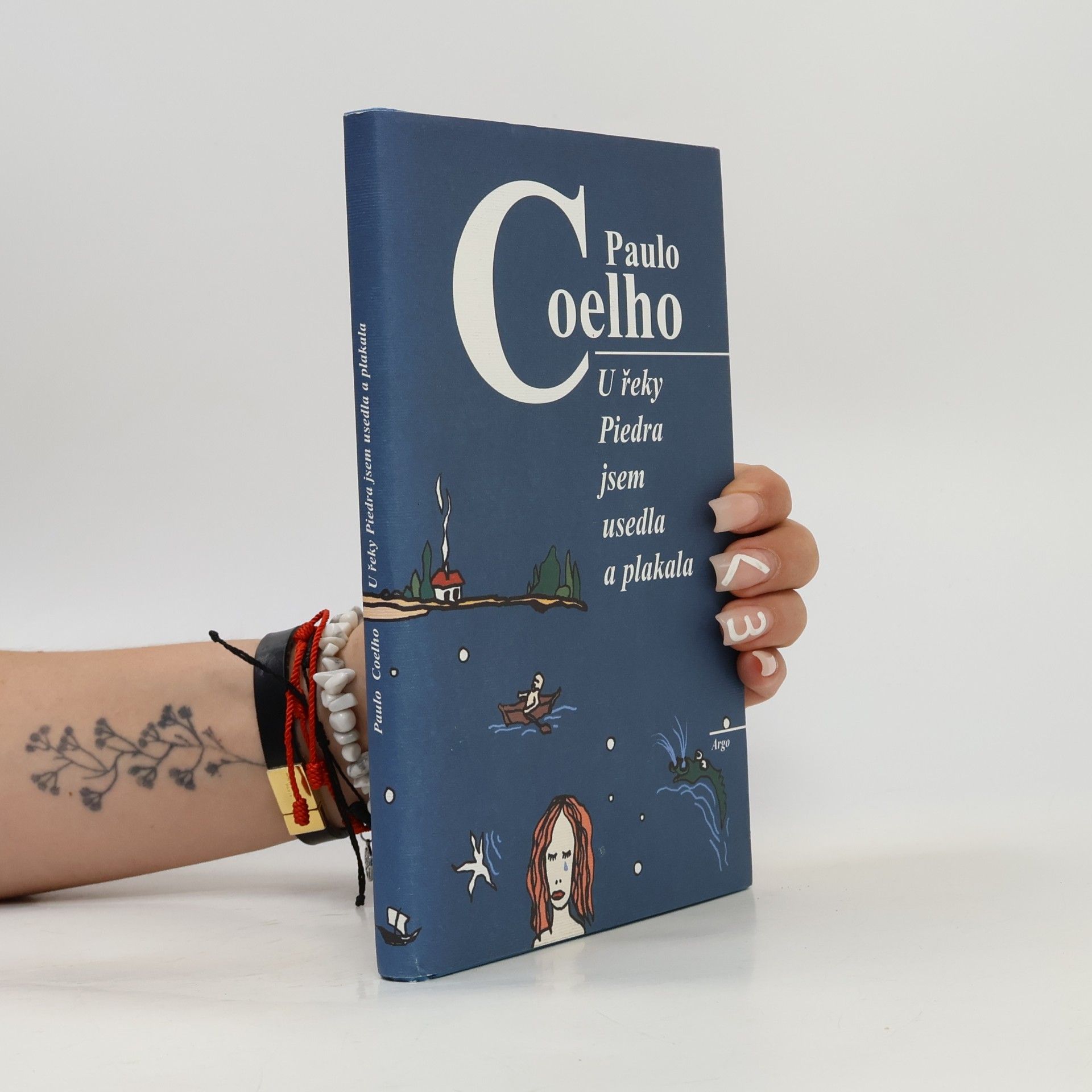 Paulo Coelho U řeky Piedra jsem usedla a plakala