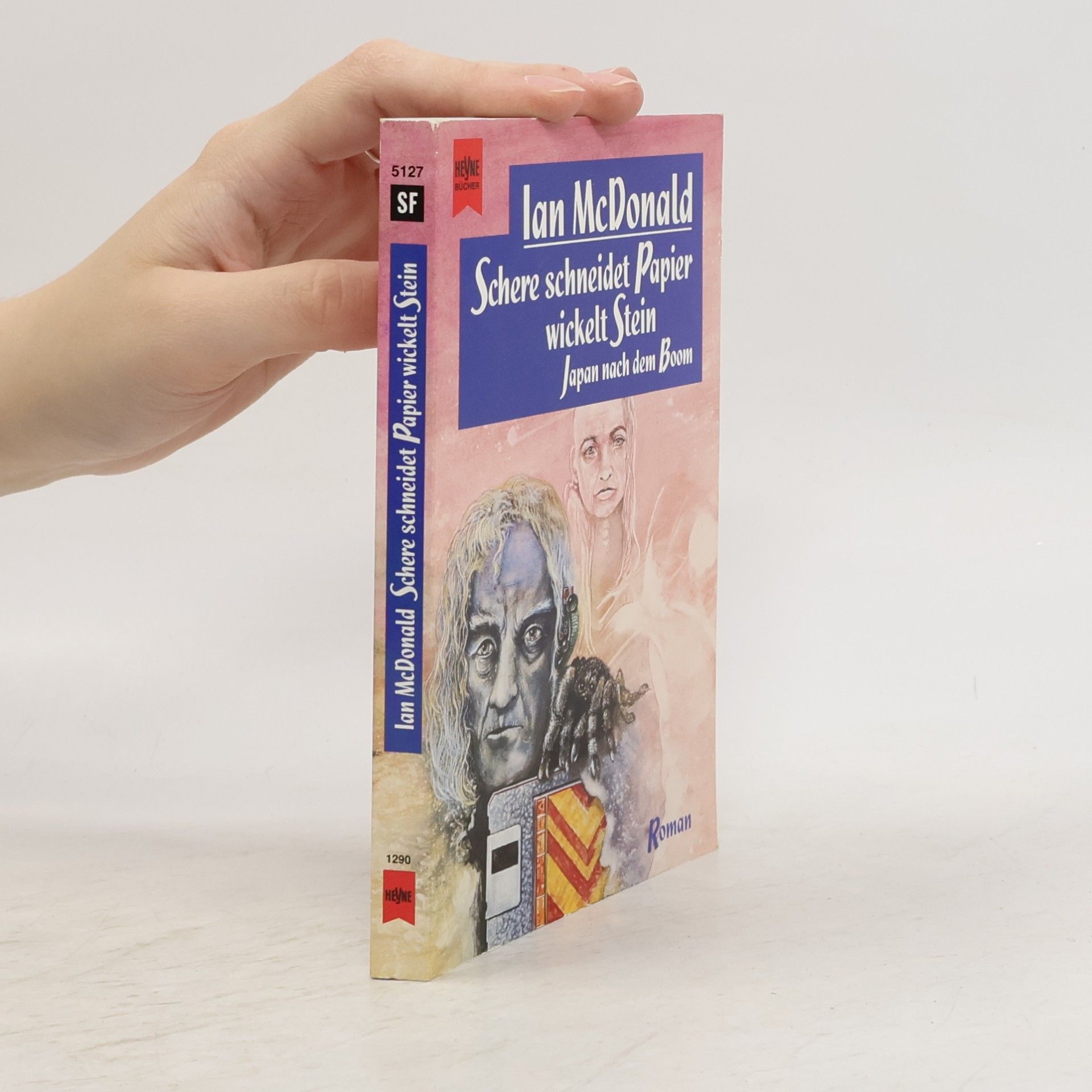 Ian McDonald Schere schneidet Papier wickelt Stein