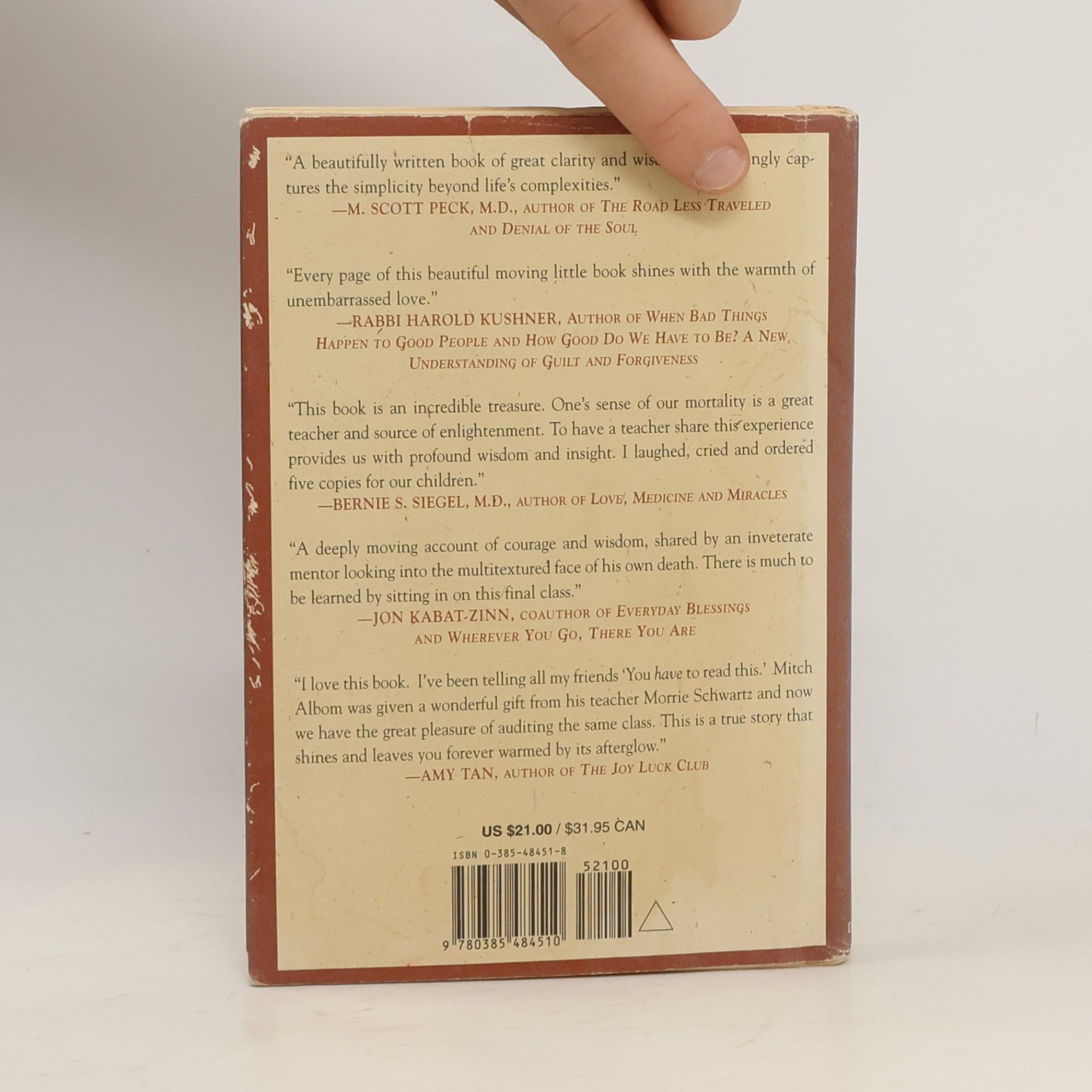 Mitch Albom Tuesdays with Morrie. An old man, a young man, and life's greatest lesson