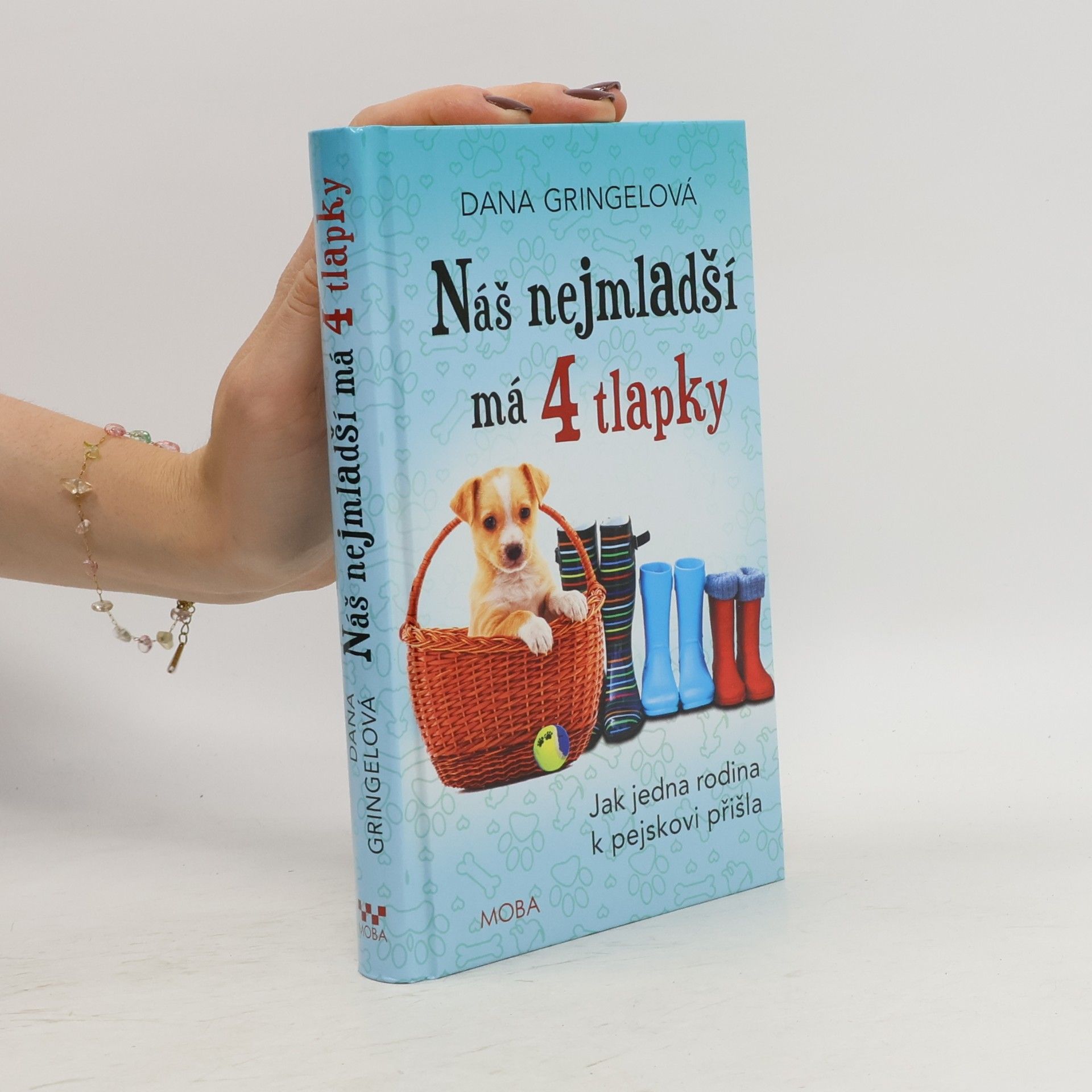 Náš nejmladší má 4 tlapky : jak jedna rodina k pejskovi přišla