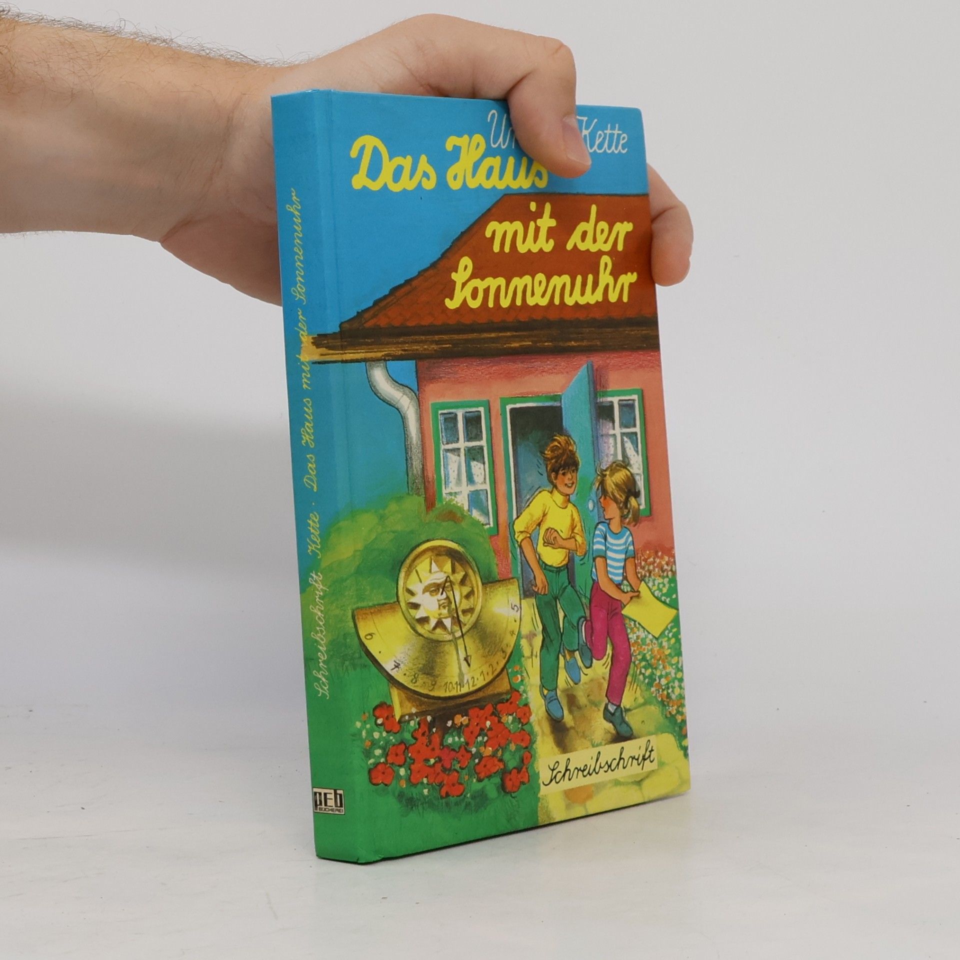 Schreibschrift: Das Haus mit der Sonnenuhr