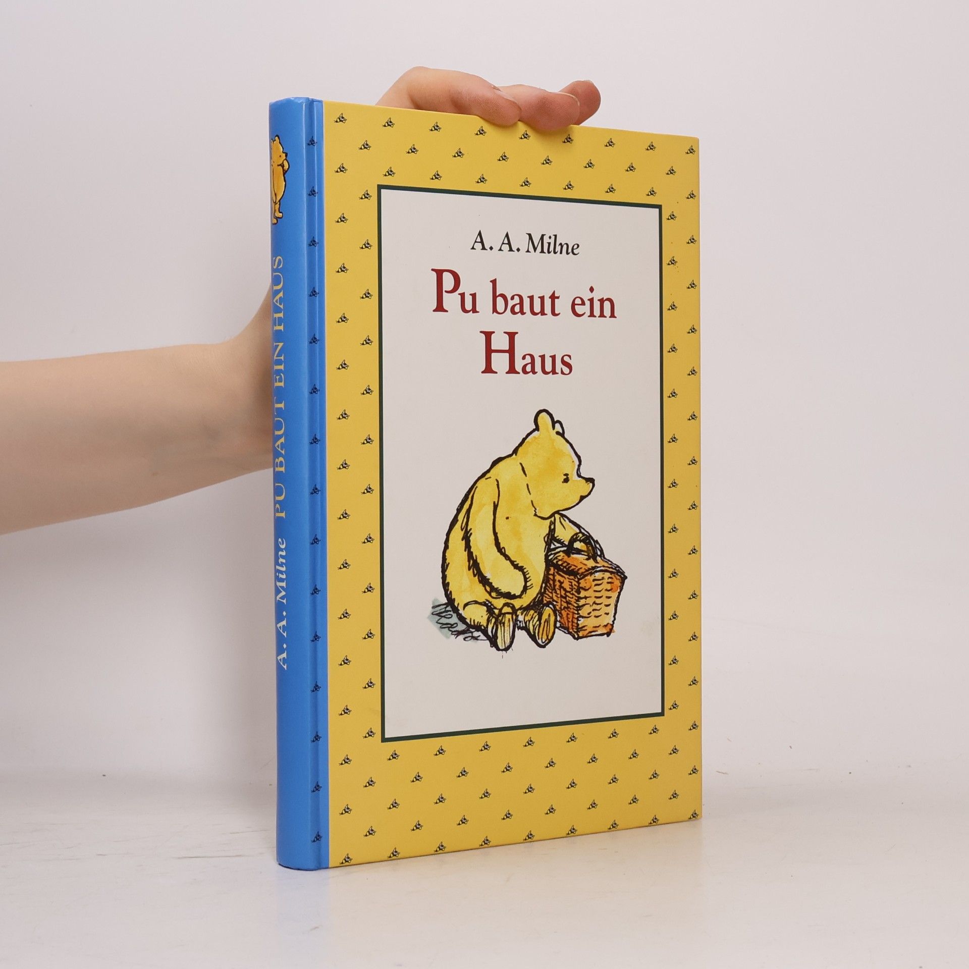 A. A. Milne Pu baut ein Haus