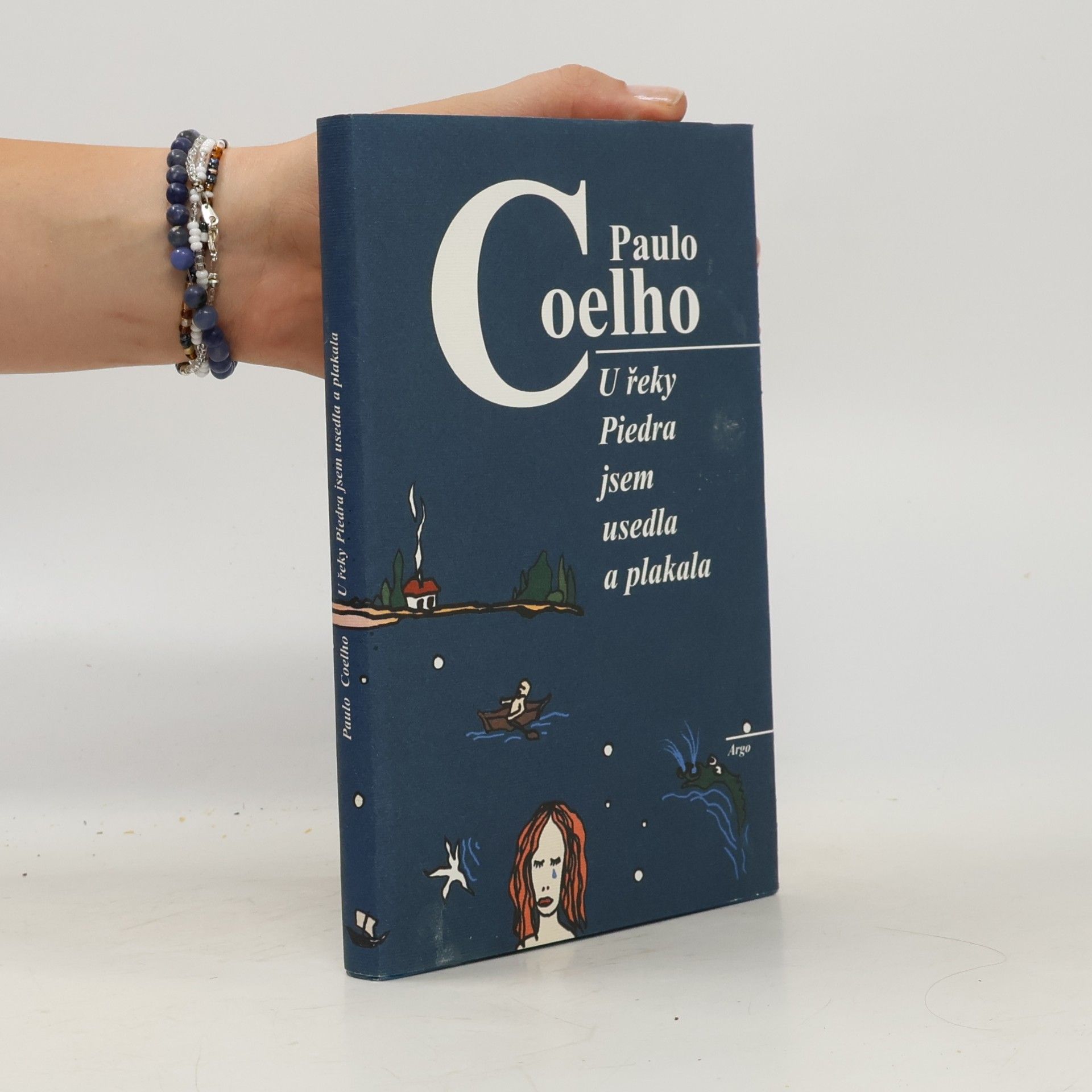 Paulo Coelho U řeky Piedra jsem usedla a plakala