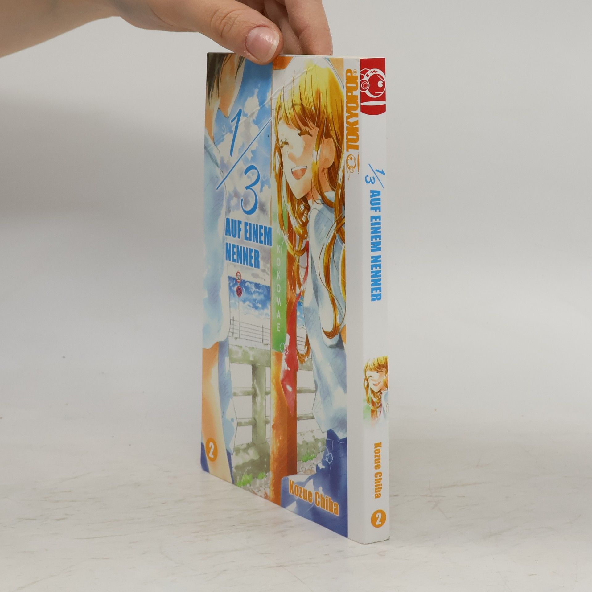 Kozue Chiba 1/3 auf einem Nenner 2
