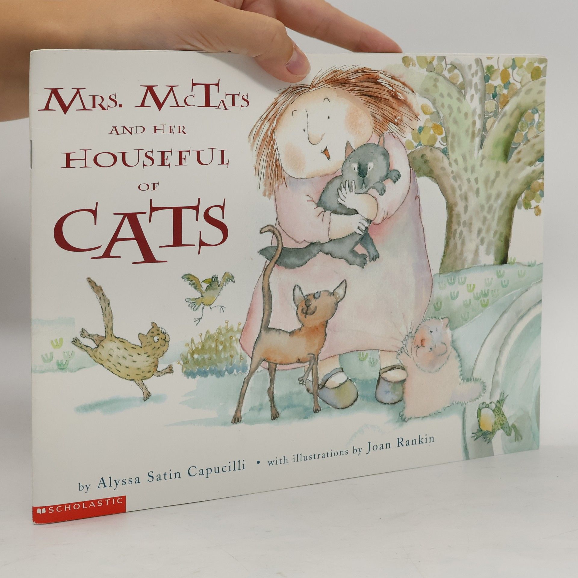 Mrs. McTats and Her Houseful of Cats