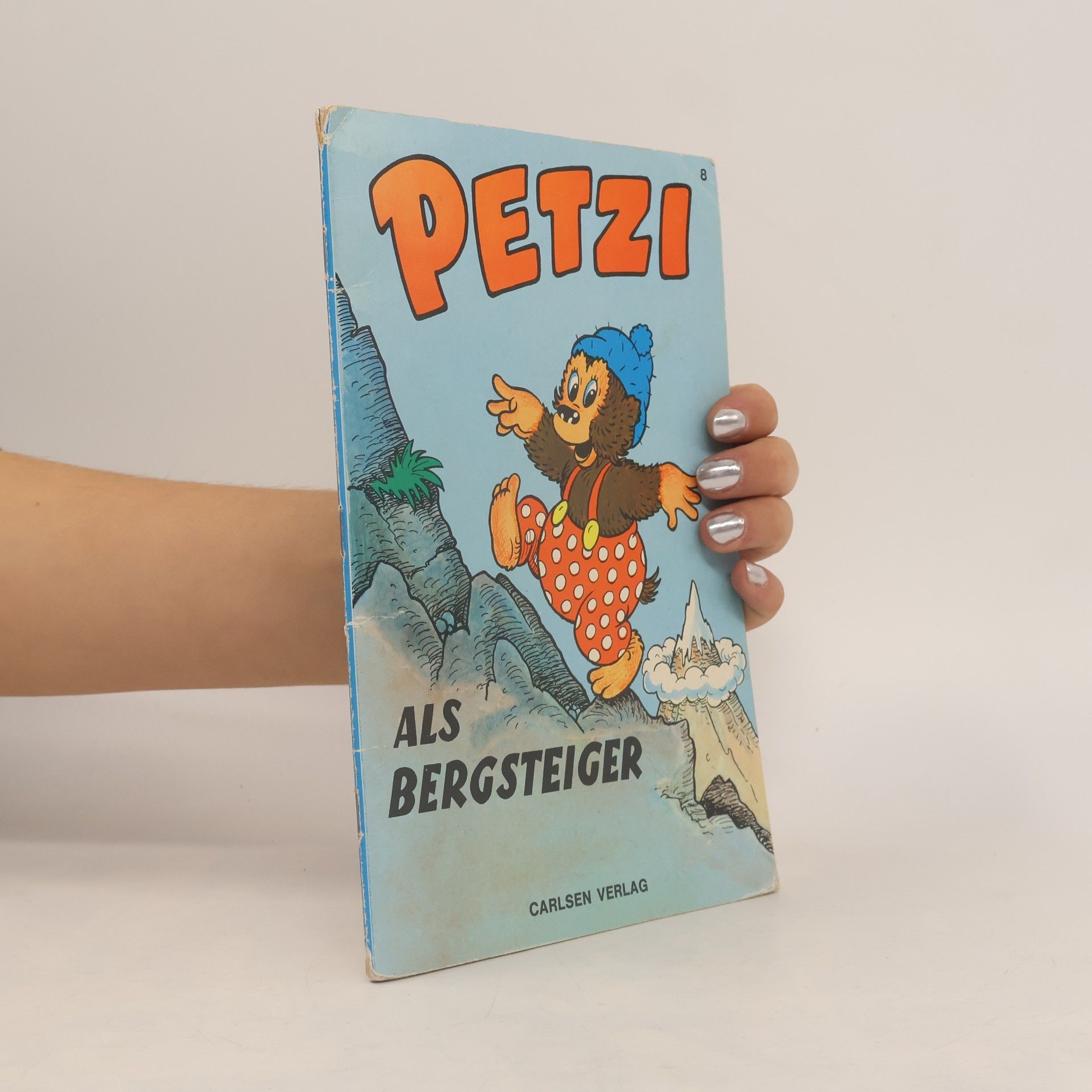Petzi als Bergsteiger