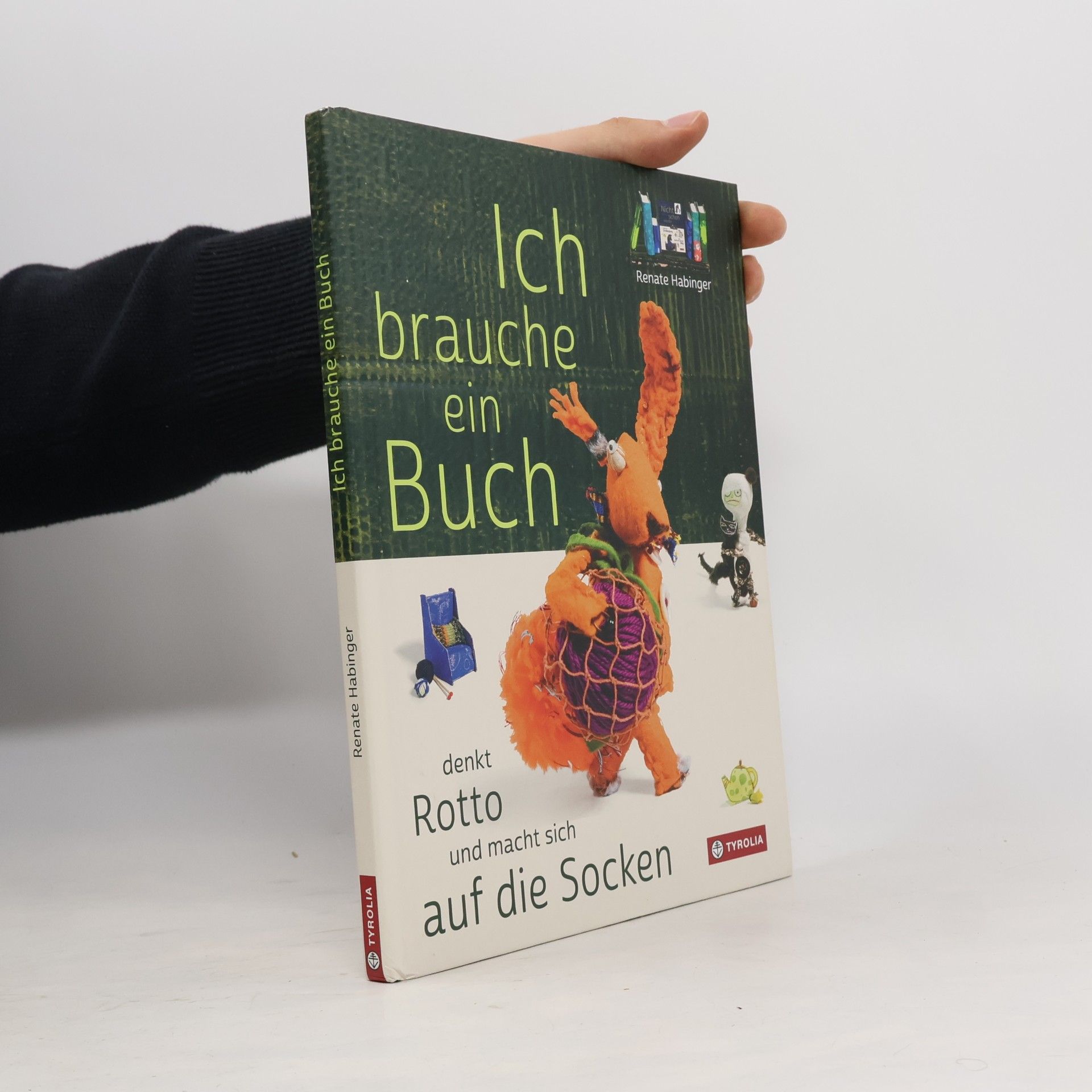 Ich brauche ein Buch, denkt Rotto und macht sich auf die Socken