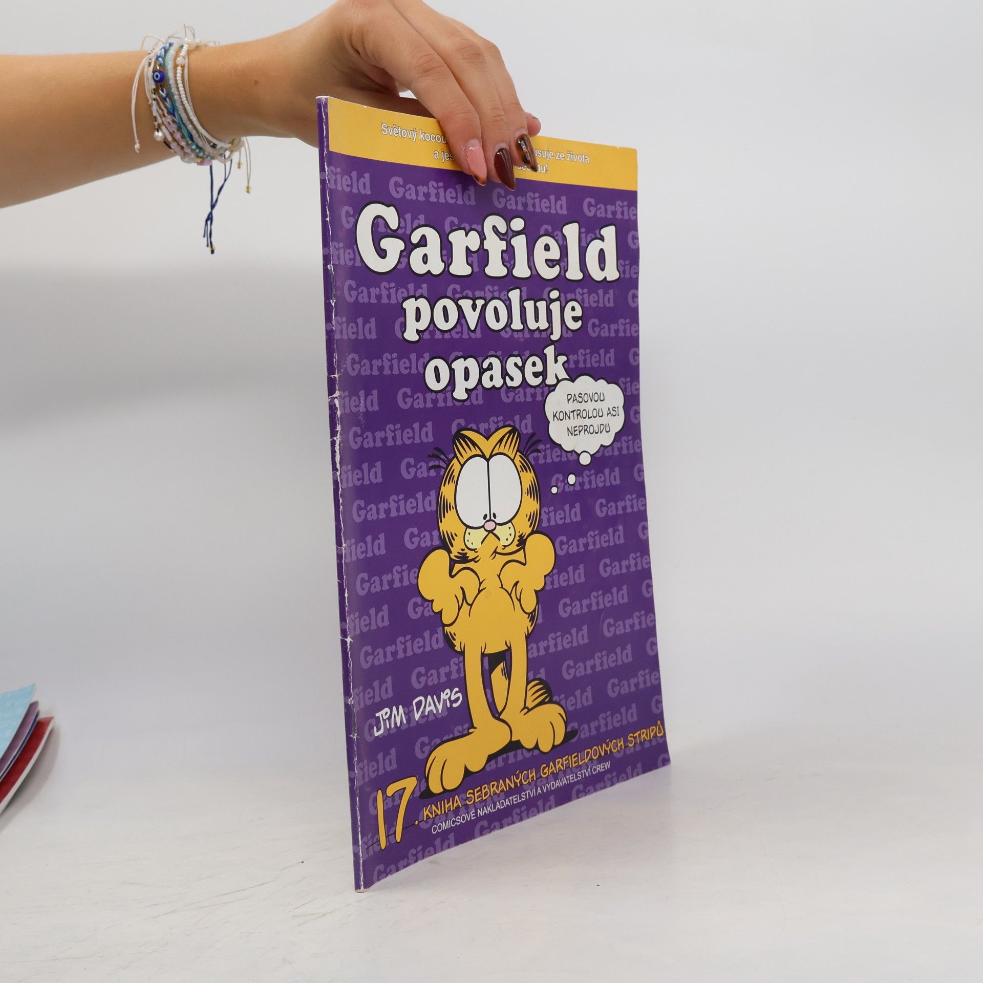 Jim Davis Garfield povoluje opasek