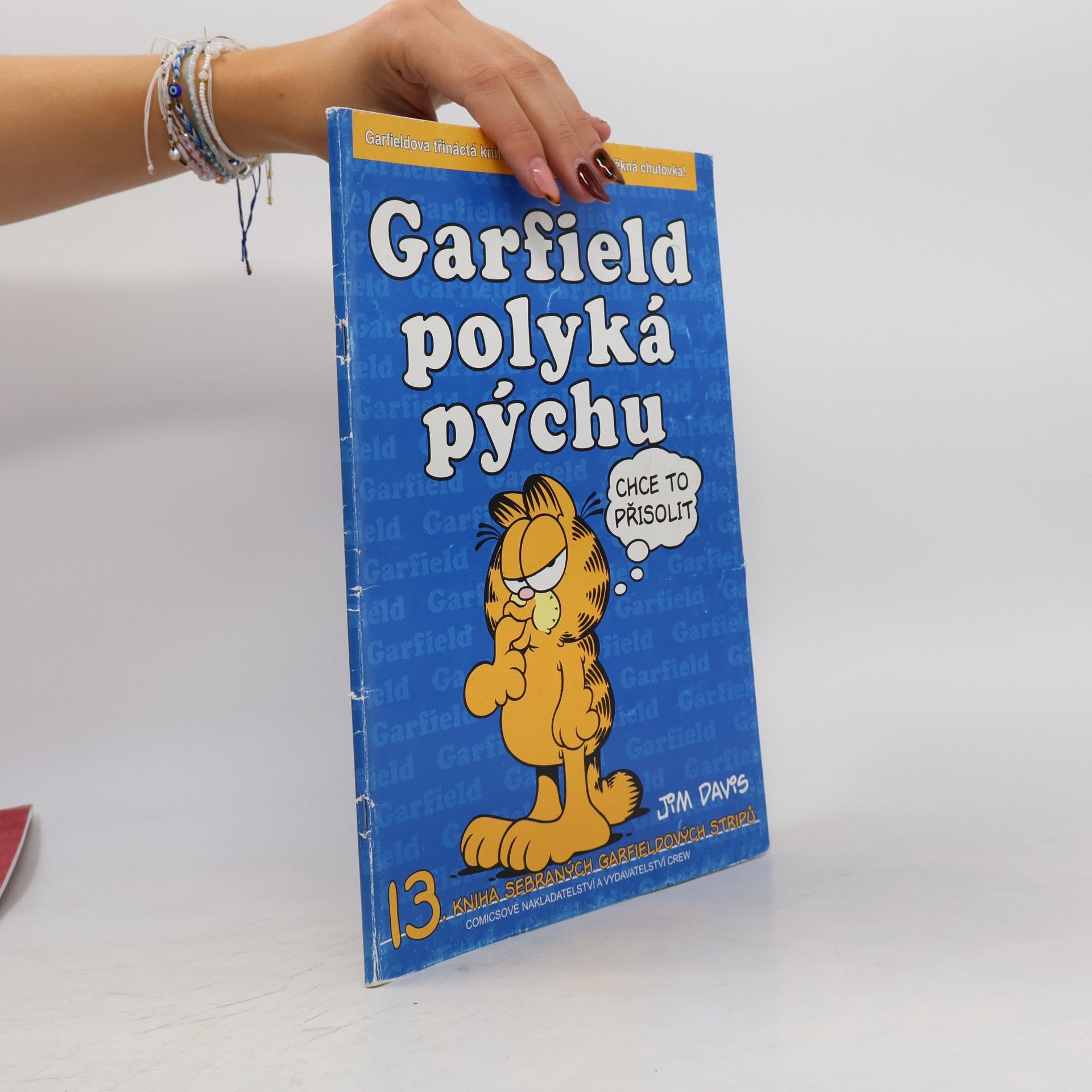 Jim Davis Garfield polyká pýchu