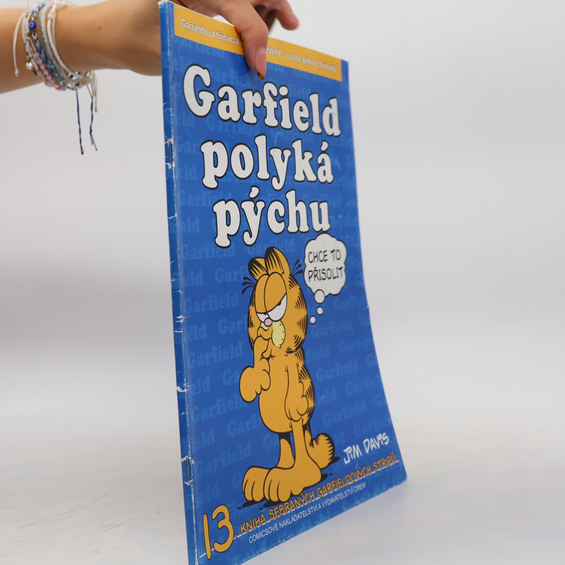 Jim Davis Garfield polyká pýchu