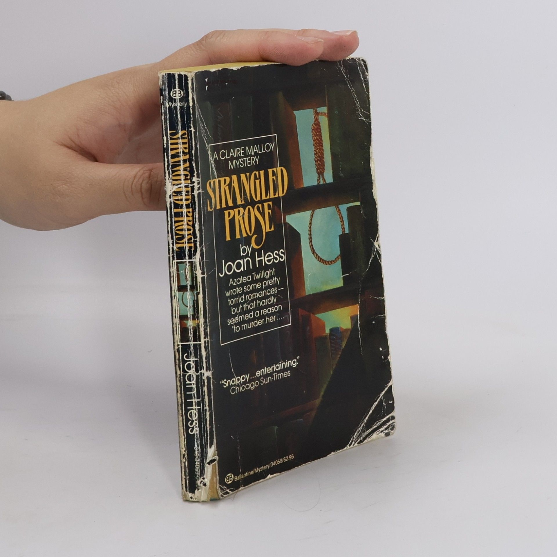 Joan Hess A Claire Malloy Mystery: Strangled Prose