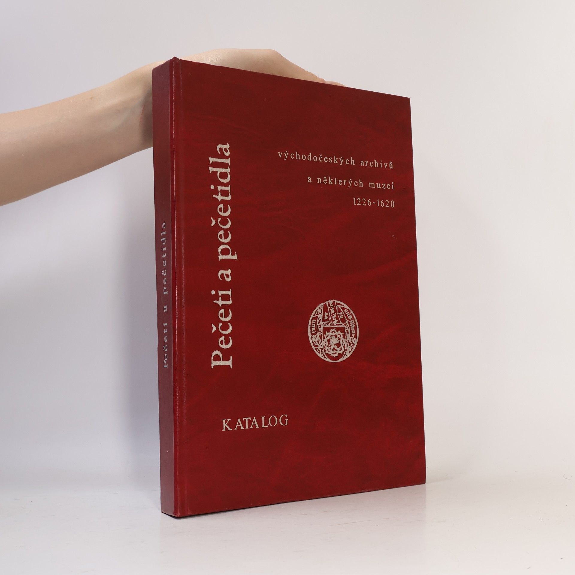 Tomáš Šimek Pečeti a pečetidla východočeských archivů a některých muzeí 1226-1620 : katalog
