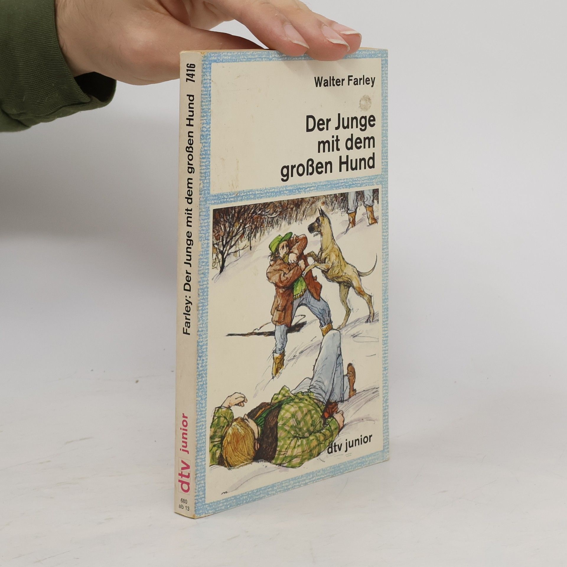 Der Junge mit dem großen Hund