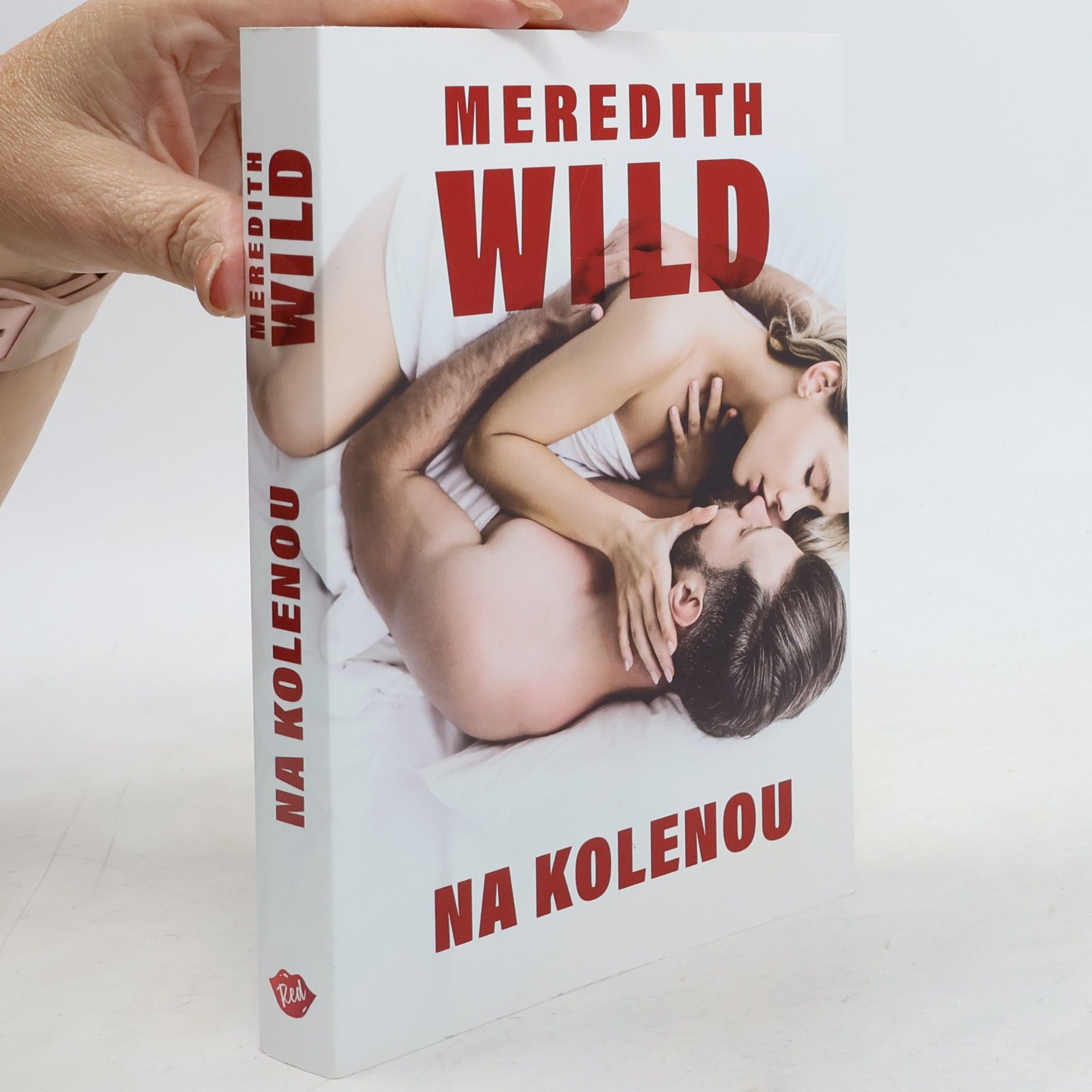 Meredith Wild Na kolenou