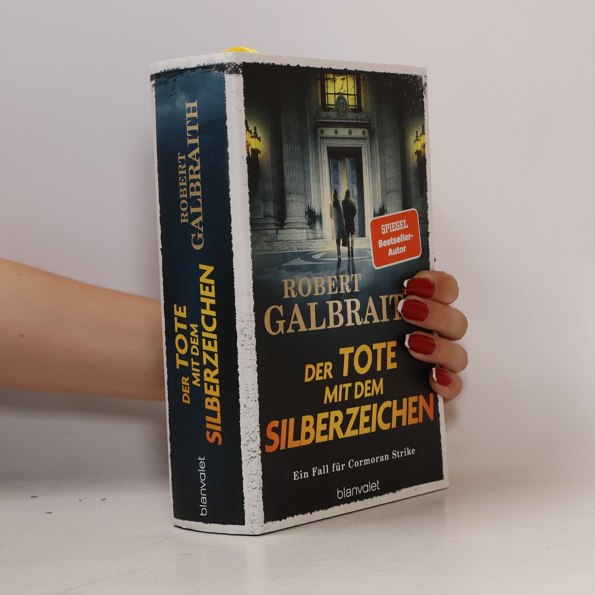 J. K. Rowling Der Tote mit dem Silberzeichen