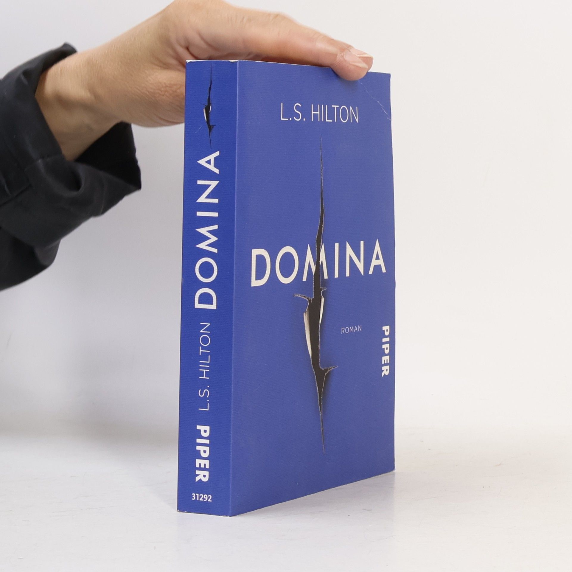 L.S. Hilton Domina