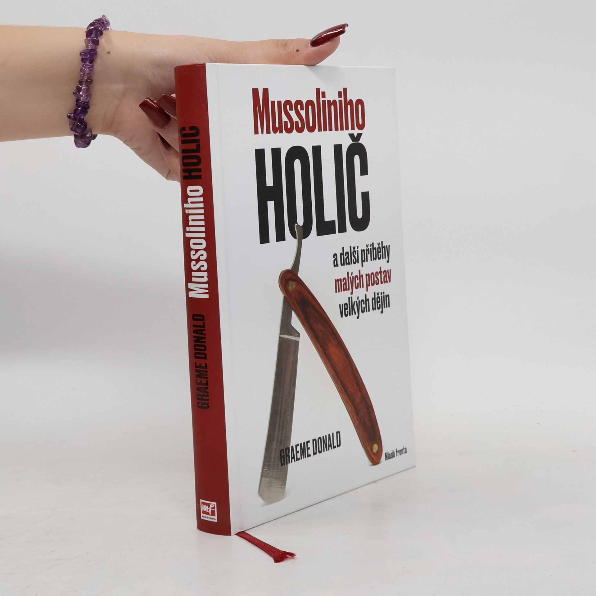Graeme Donald Mussoliniho holič a další příběhy malých postav velkých dějin