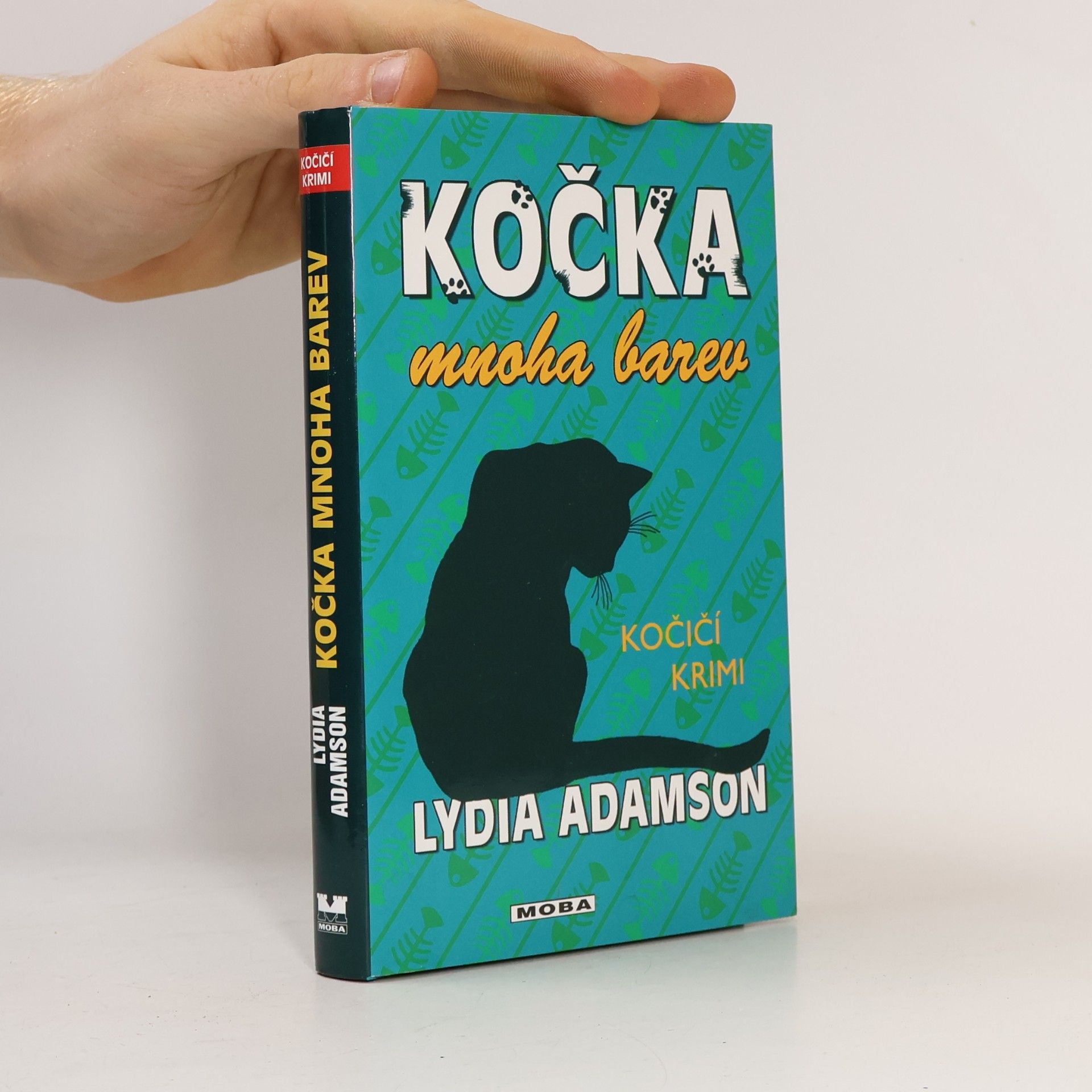 Lydia Adamson Kočka mnoha barev