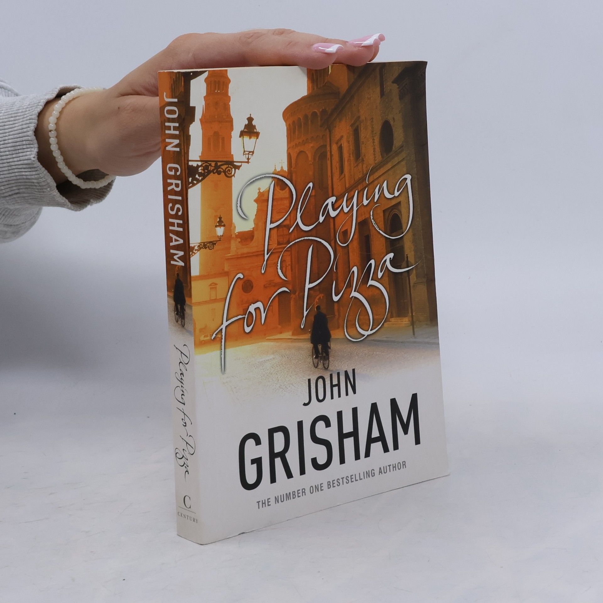 John Grisham Playing for pizza