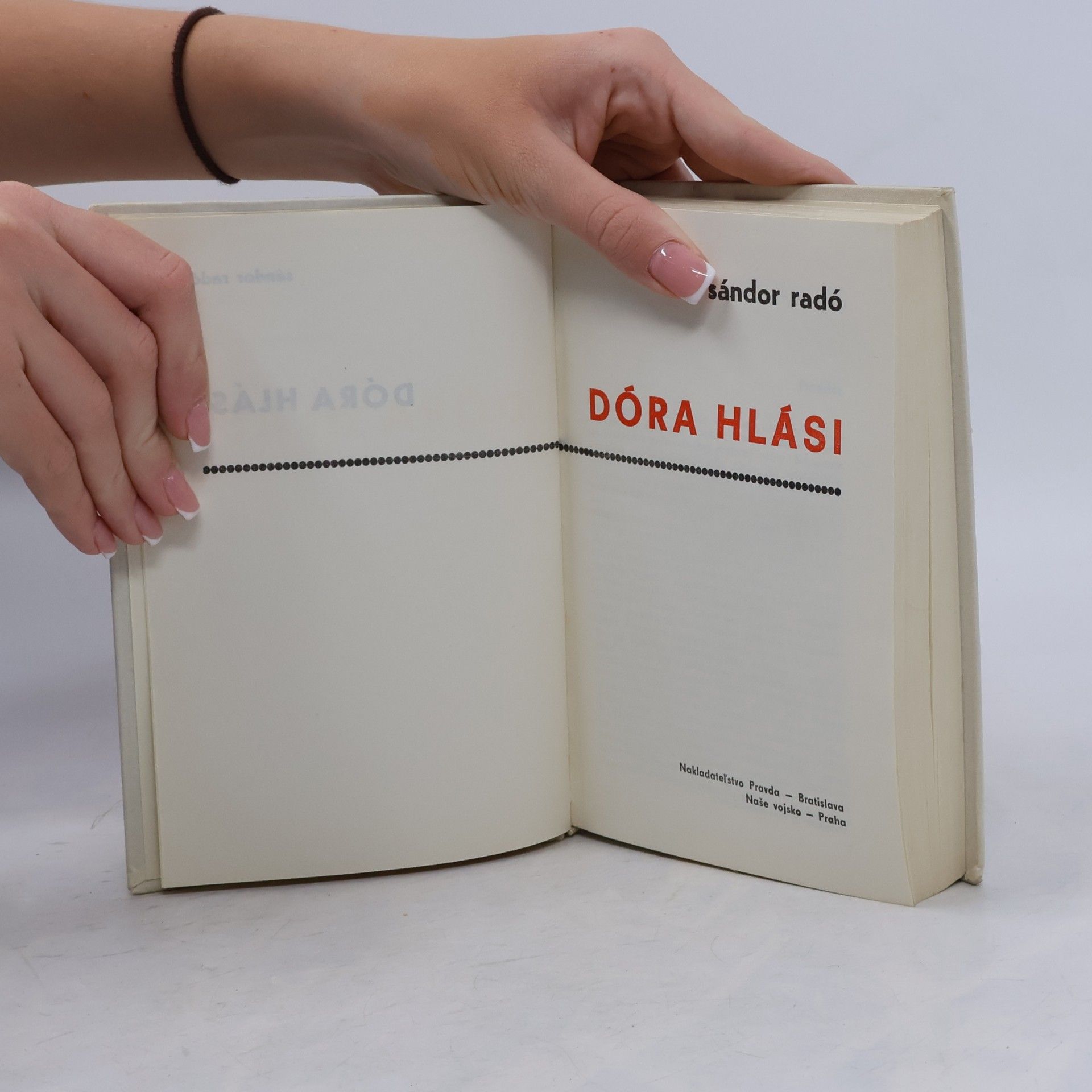 Sándor Radó Dóra hlási