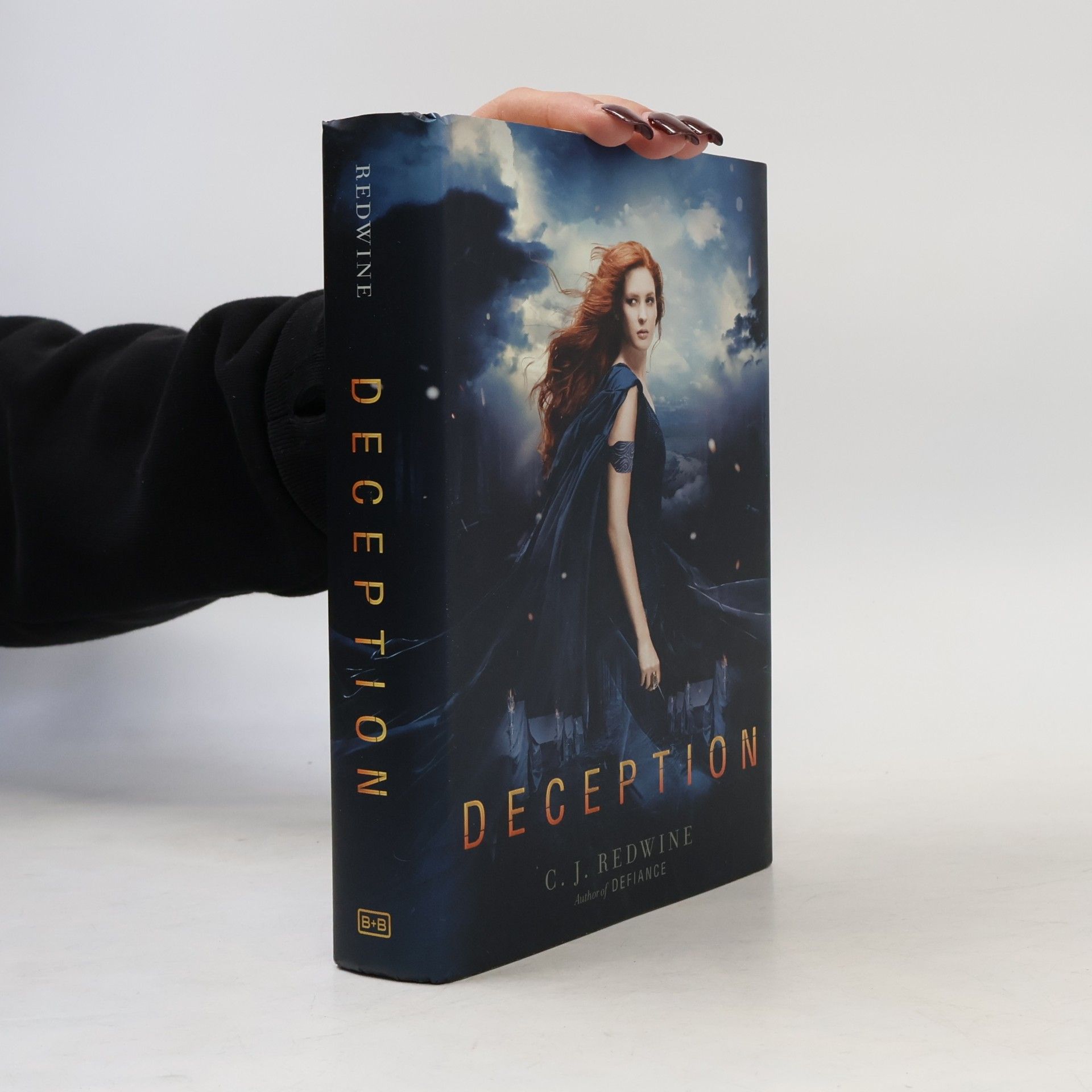 C. J. Redwine Deception