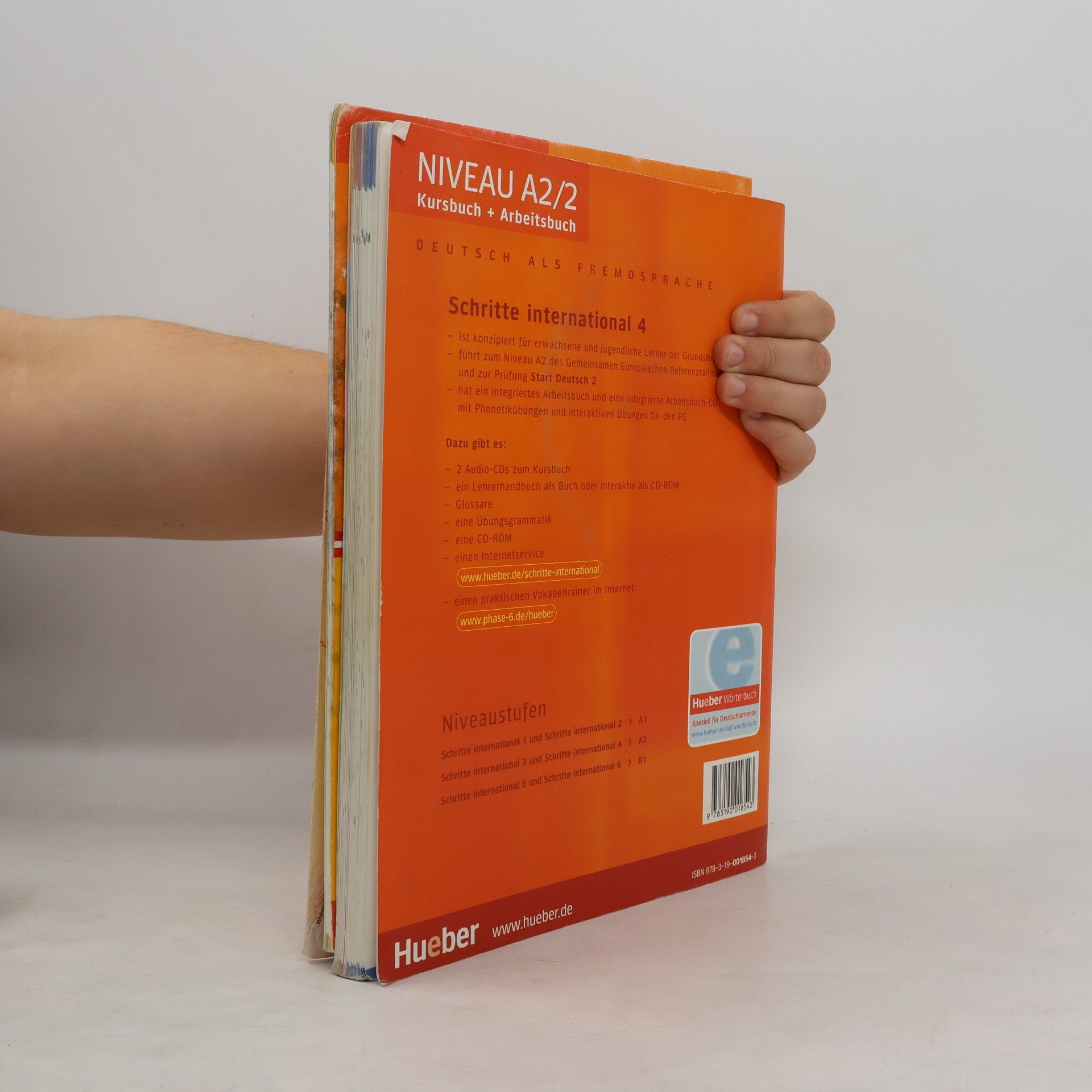 Various authors Schritte international Neu 4 : Niveau A2. Kursbuch + Arbeitsbuch. Glossar XXL.