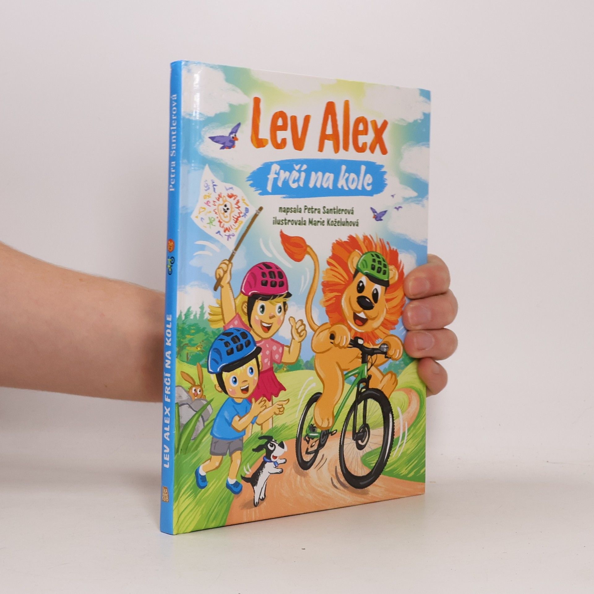 Petra Santlerová Lev Alex frčí na kole