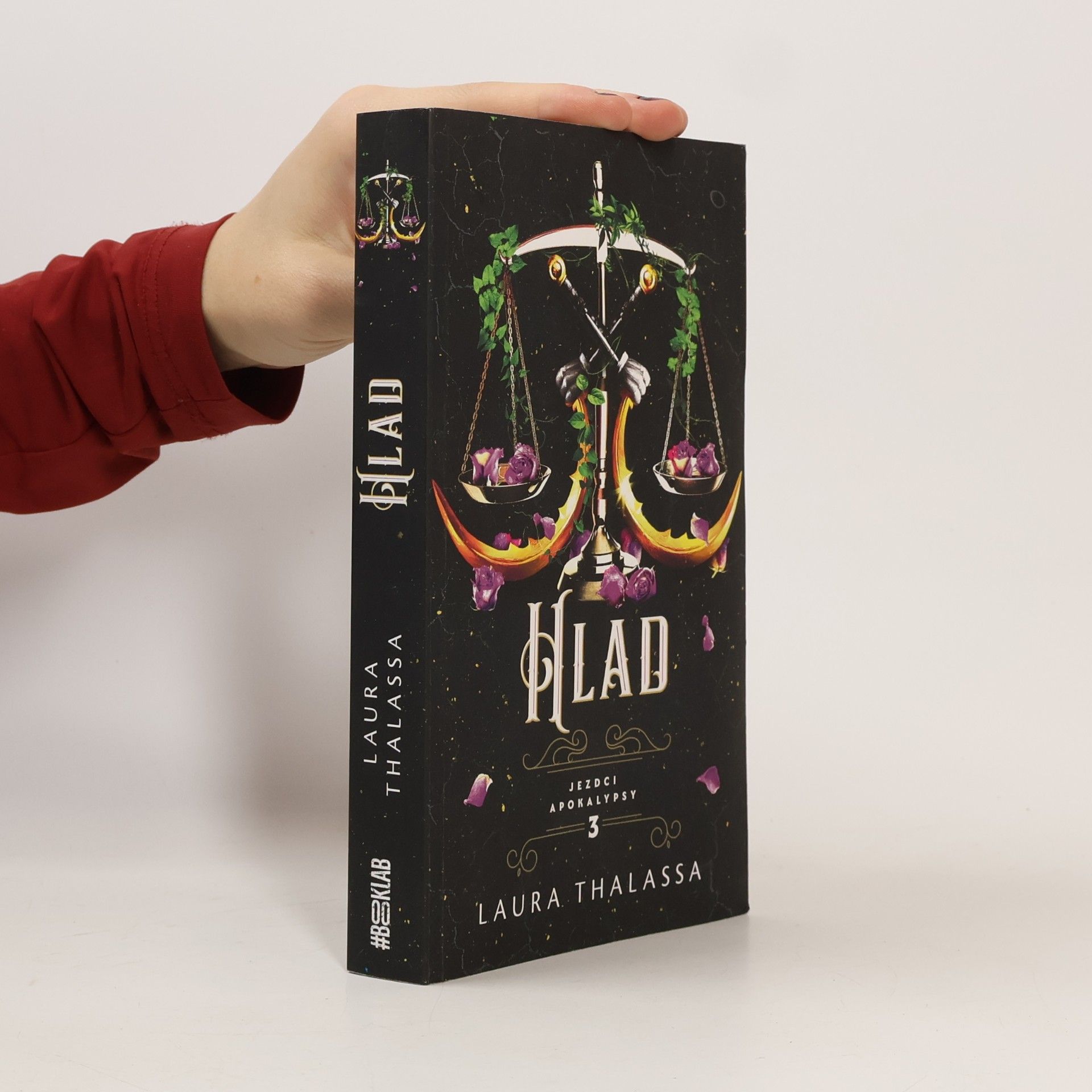 Laura Thalassa Hlad