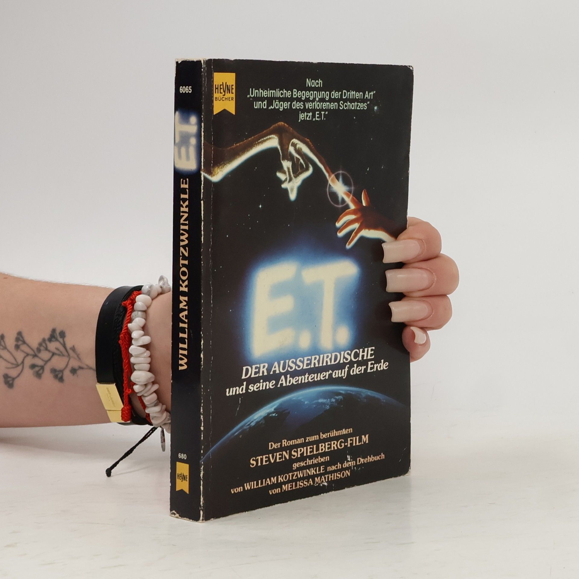 E. T.