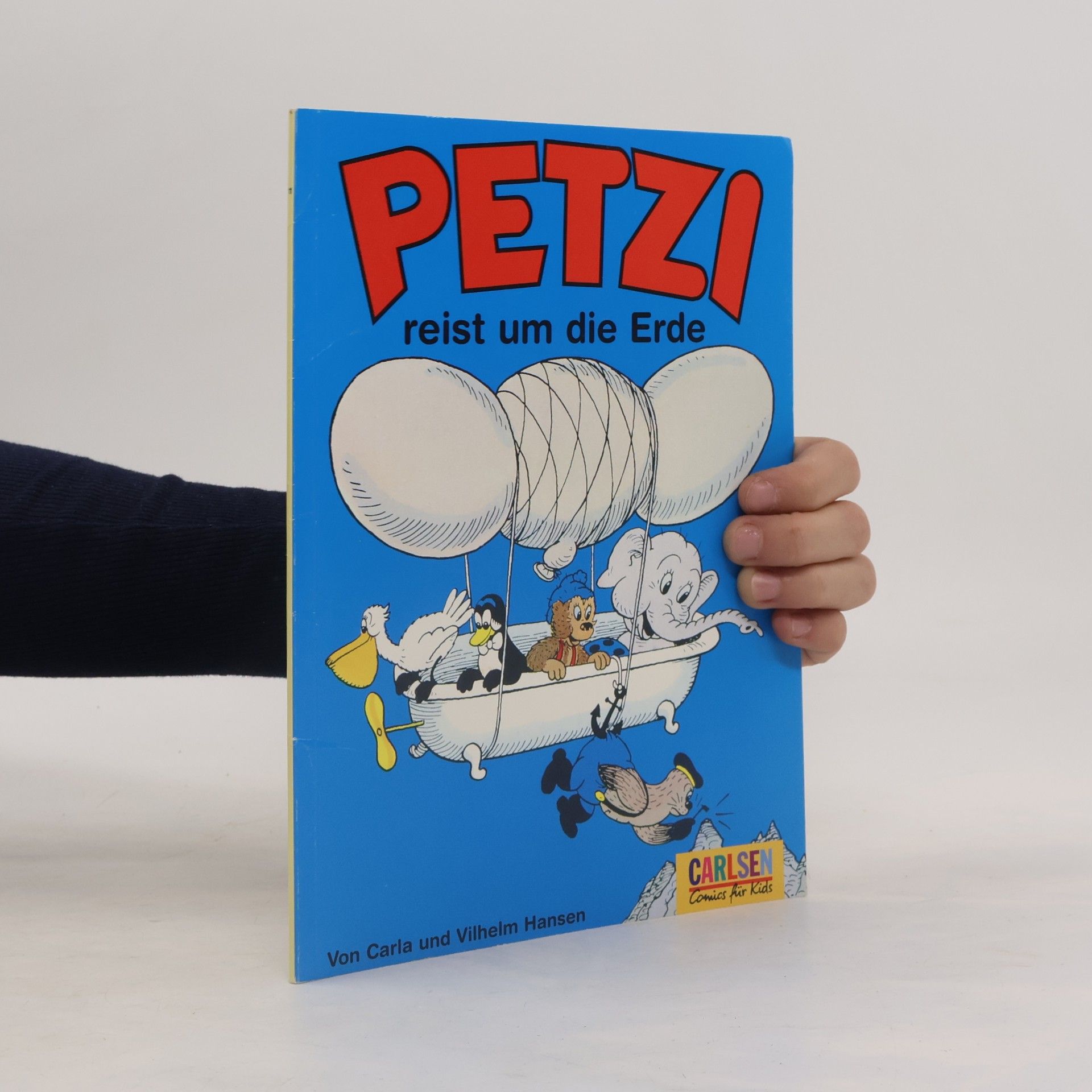 Petzi reist um die Erde