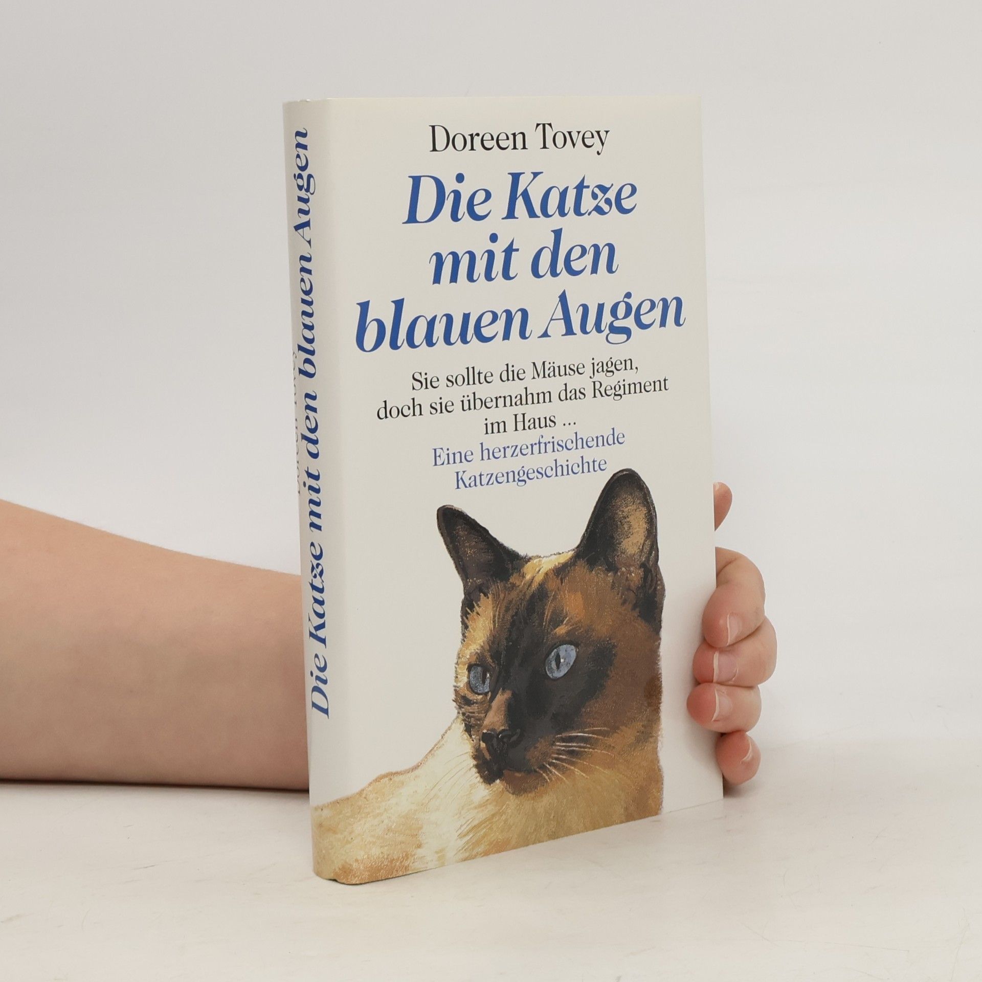 Die Katze mit den blauen Augen